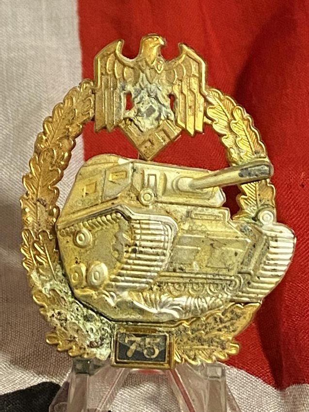 GERMAN WW2 PANZER ASSAULT BADGE FOR 75 ENGAGEMENTS: GERMAN WW2 PANZER ASSAULT BADGE FOR 75 ENGAGEMENTS. IN EXCELELNT OVERALL SHAPE AND CONDITION WITH A BEAUTIFUL OVERALL PATINA. THIS BADGE IS MAKER MARKED JFS ON THE BACK. A GREAT FIND AND AN EXCELLENT 