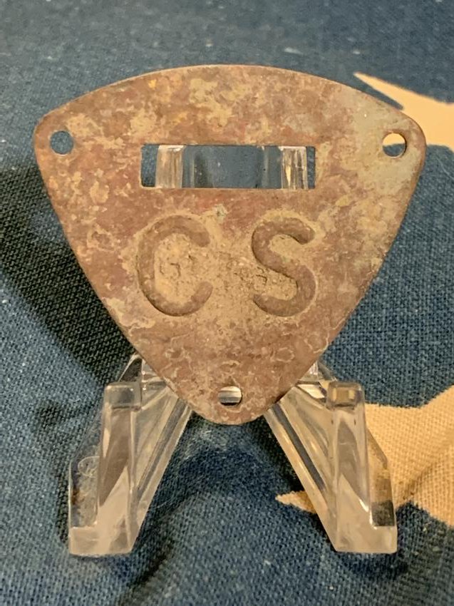 VERY RARE CIVIL WAR C.S. CONFEDERATE SADDLE SHIELD: VERY RARE CIVIL WAR C.S. CONFEDERATE SADDLE SHIELD PLATE. APPEARS TO BE IN DUG OVERALL SHAPE AND CONDITION WITH FAIRLY VISIBLE C.S. ON IT. ORIGINS: UNKNOWN. OVERALL A GREAT FIND AND AN EXCELLENT ADDIT