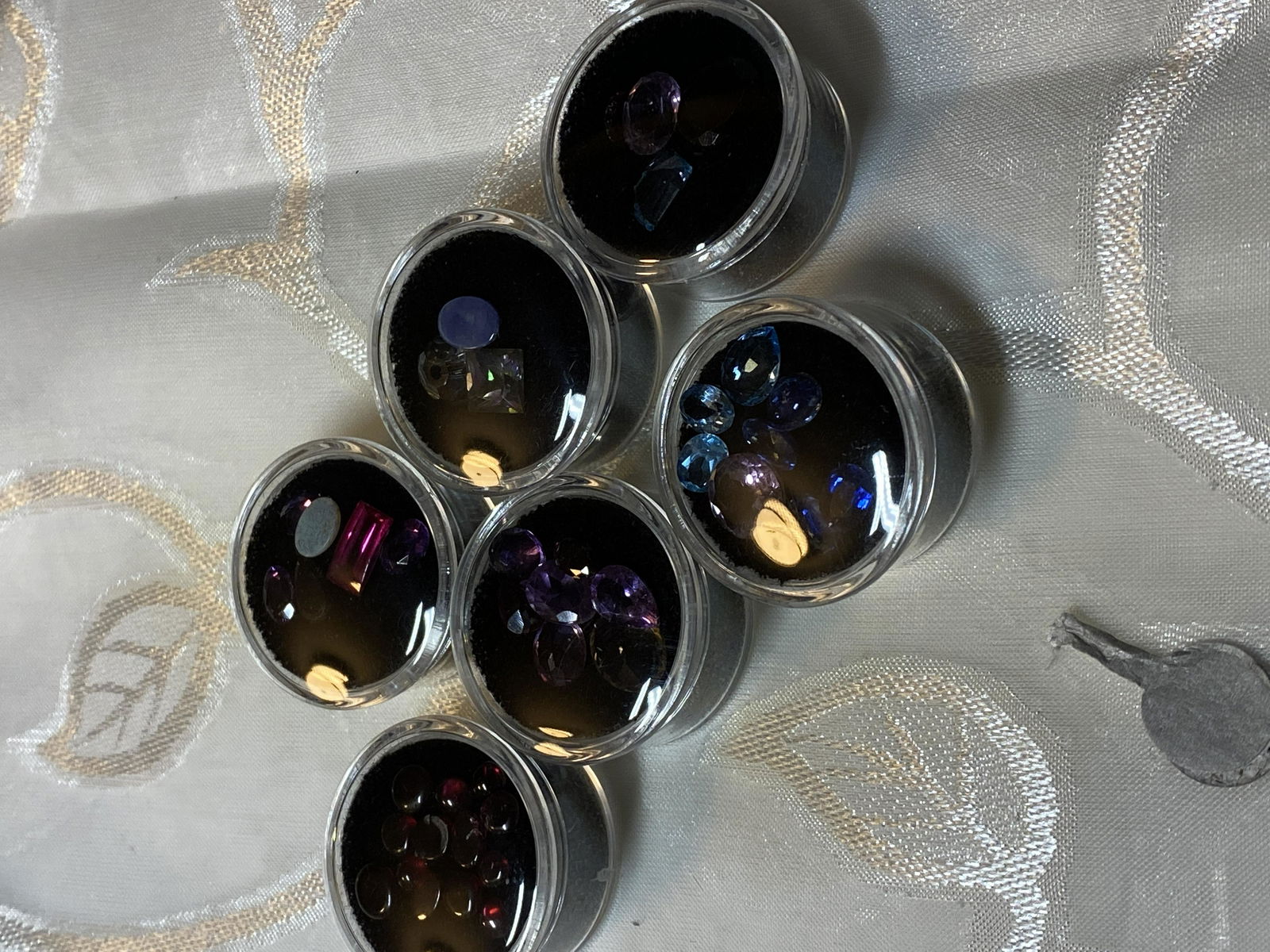 LOT OF (6) CASES OF LOOSE GEMSTONES - RUBY, AQUAMARINE, (1 of 3)