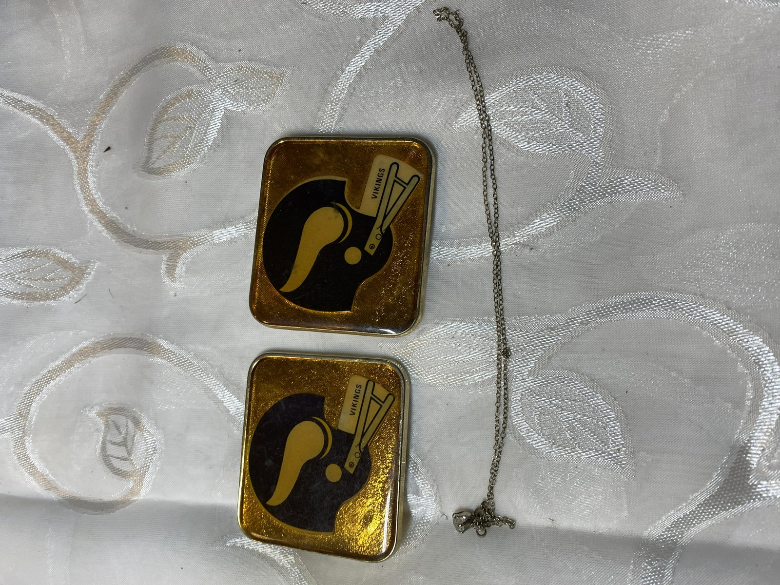 LOT OF (2) VIKINGS FOOTBALL BELT BUCKLES & CHAIN: LOT OF (2) VIKINGS FOOTBALL BELT BUCKLES & CHAIN