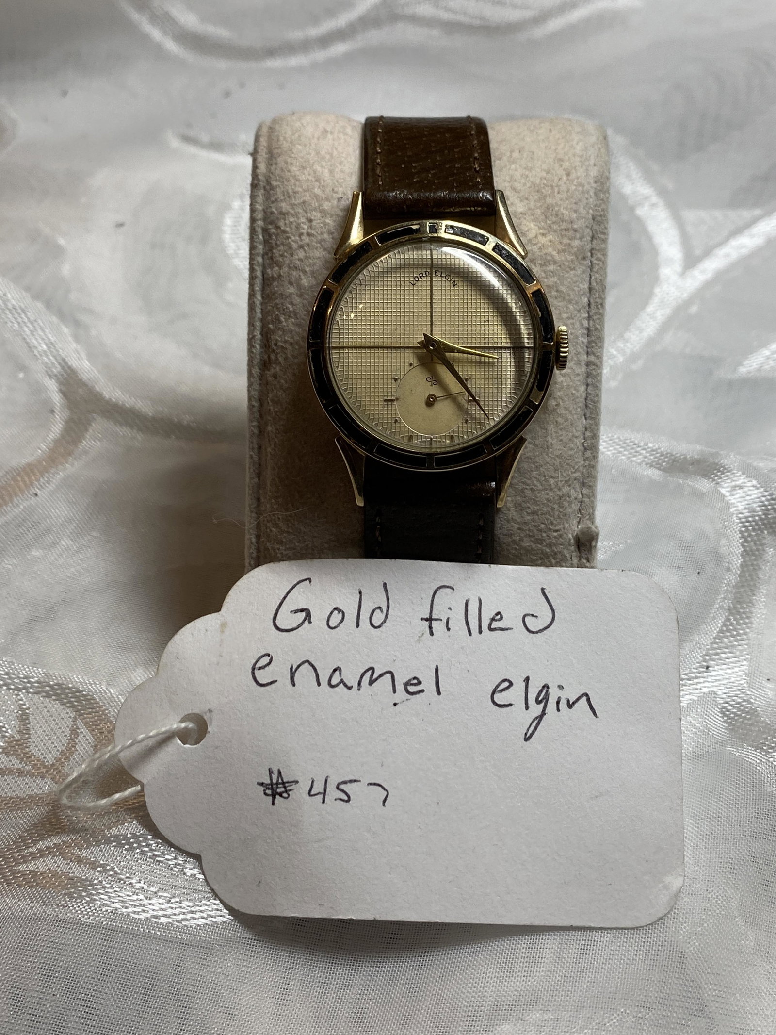 LORD ELGIN MENS GOLD FILLED ENAMEL WATCH: LORD ELGIN MENS GOLD FILLED ENAMEL WATCH. WORKS AND KEEPS TIME. A GREAT ADDITION TO YOUR COLLECTION.