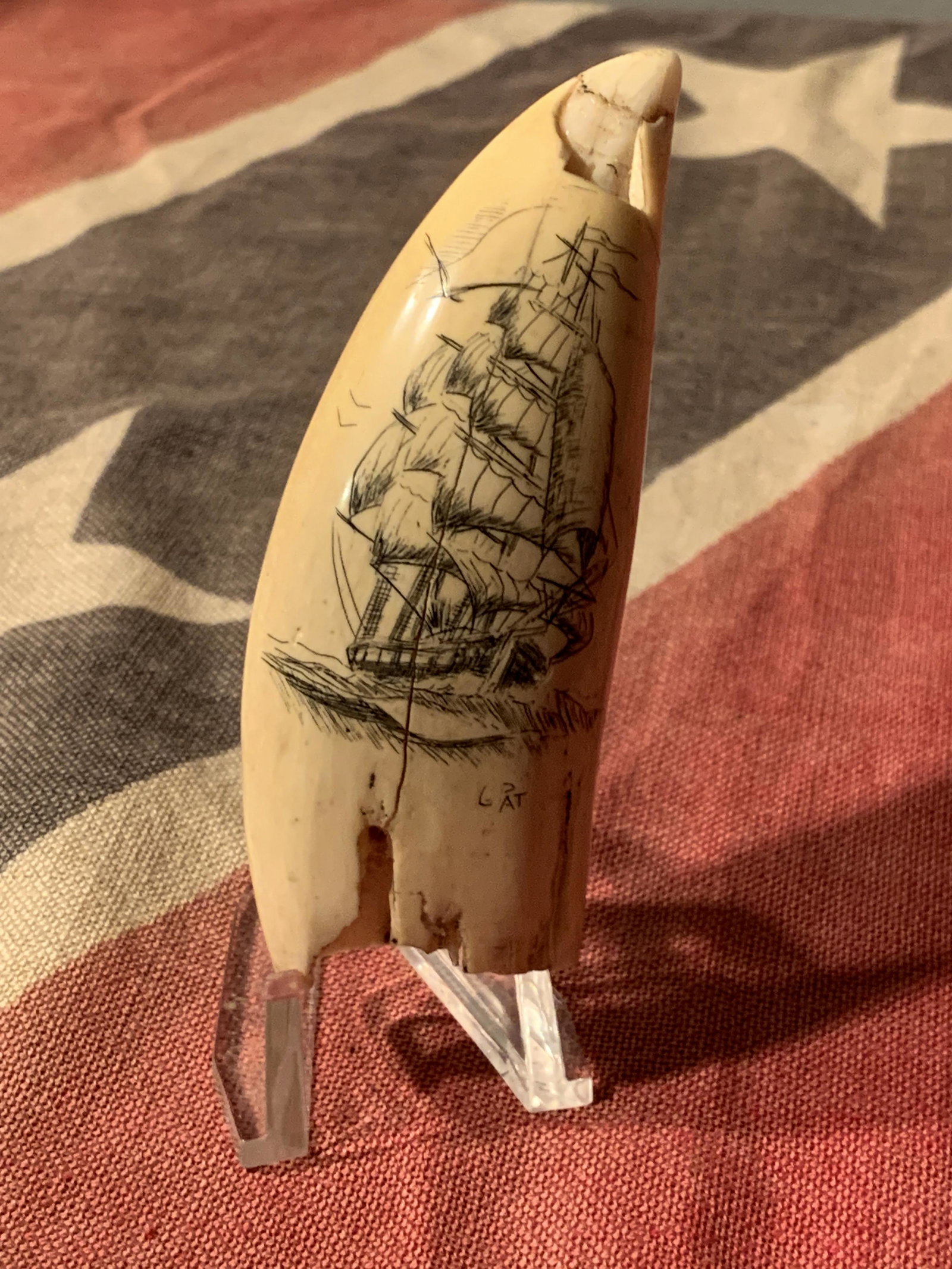CIVIL WAR NAVAL ID'D SCRIMSHAW ON WHALE TOOTH: CIVIL WAR NAVAL ID'D SCRIMSHAW ON WHALE TOOTH. IN MINT OVERALL SHAPE AND CONDITION WITH VERY DETAILED CRAFTSMANSHIP. HAS A BEAUTIFUL SHIP DESIGN WITH ID'D BY THE SAILOR WHO CREATED THIS MASTERPIECE. A