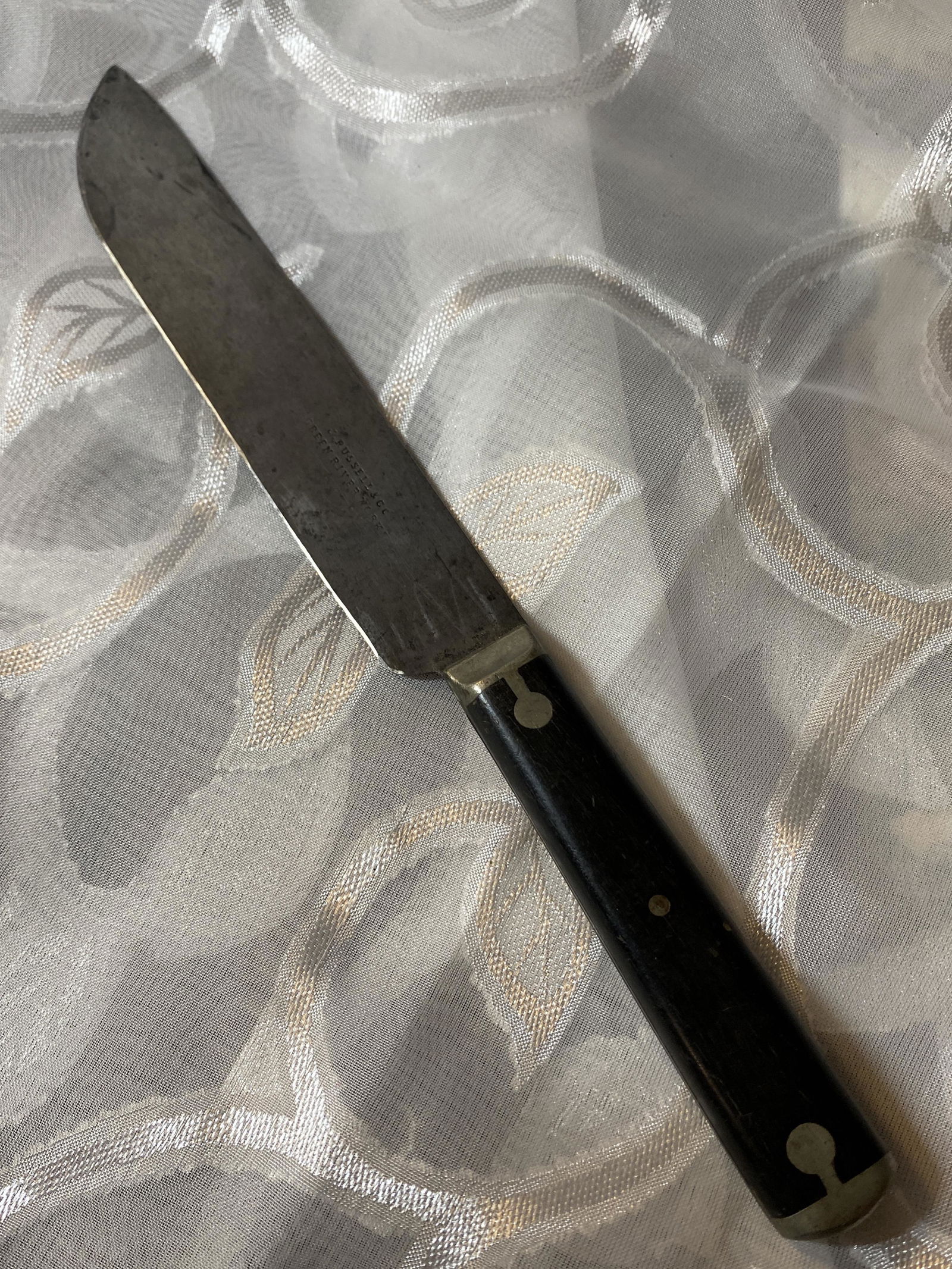 CIVIL WAR RUSSELL & CO. EBONY WOOD HANDLE FIGHTING: CIVIL WAR RUSSELL & CO. EBONY WOOD HANDLE FIGHTING KNIFE. IN EXCELLENT SHAPE AND OVERALL CONDITION WITH A BEAUTIFUL OVERALL PATINA. THIS KNIFE HAS SEEN A TON OF ACTION. COMES FROM A MUSEUM COLLECTION.