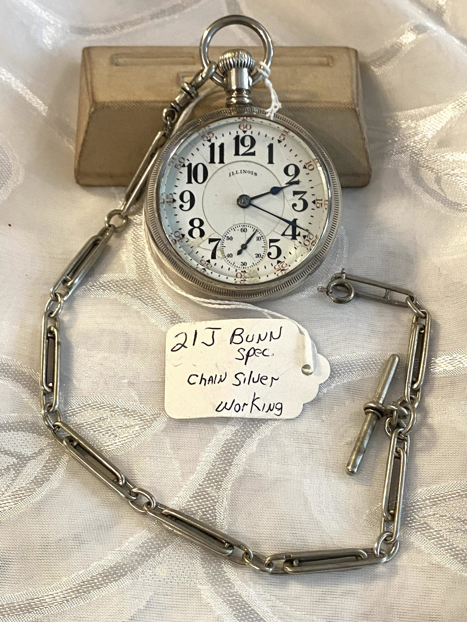 ILLINOIS 21J BUNN SPECIAL RAILROAD POCKET WATCH W/FOB -: ILLINOIS 21J BUNN SPECIAL RAILROAD POCKET WATCH W/FOB - STERLING SILVER. IN GOOD OVERALL SHAPE AND CONDITION. WATCH RUNS AND KEEPS TIME, HOWEVER, WE DO NOT GUARANTEE THE ACCURACY OF TIME. THIS IS A VE