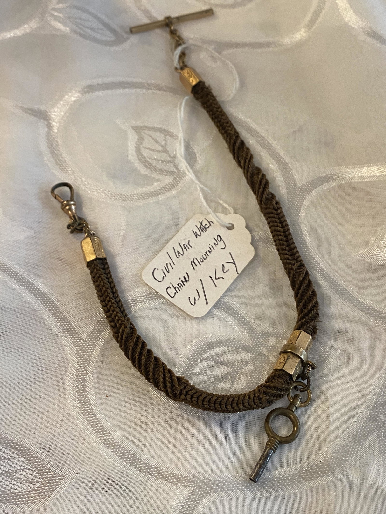 RARE CIVIL WAR BRAIDED HAIR WATCH FOB W/KEY: RARE CIVIL WAR BRAIDED HAIR WATCH FOB W/KEY. IN MINT OVERALL SHAPE AND EXCELLENT OVERALL CONDITION. PLEASE VIEW ALL DETAILED PICTURES. MOST PROBABLY BELONGED TO A HIGH RANKING CIVIL WAR OFFICER.