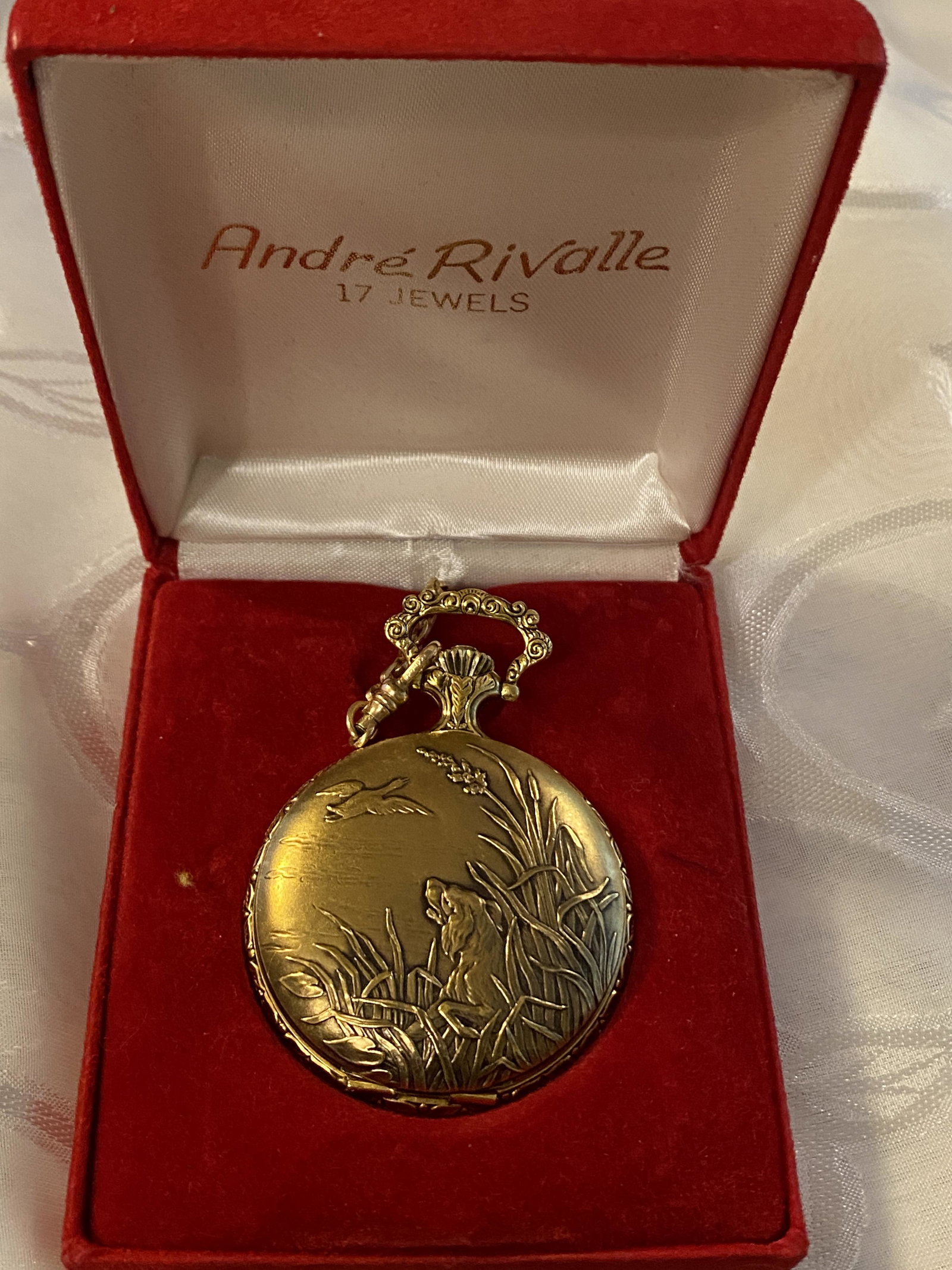 ANDRE RIVALLE 17J HUNTING CASE POCKET WATCH IN ORIG.: ANDRE RIVALLE 17J HUNTING CASE POCKET WATCH IN ORIG. BOX. IN GOOD SHAPE AND OVERALL CONDITION. KEEPS GOOD TIME, WINDS, TICKS, ETC. ALSO INCLUDED IS THE ORIGINAL WARRANTY CARD THAT WAS GIVEN WHEN PURCH