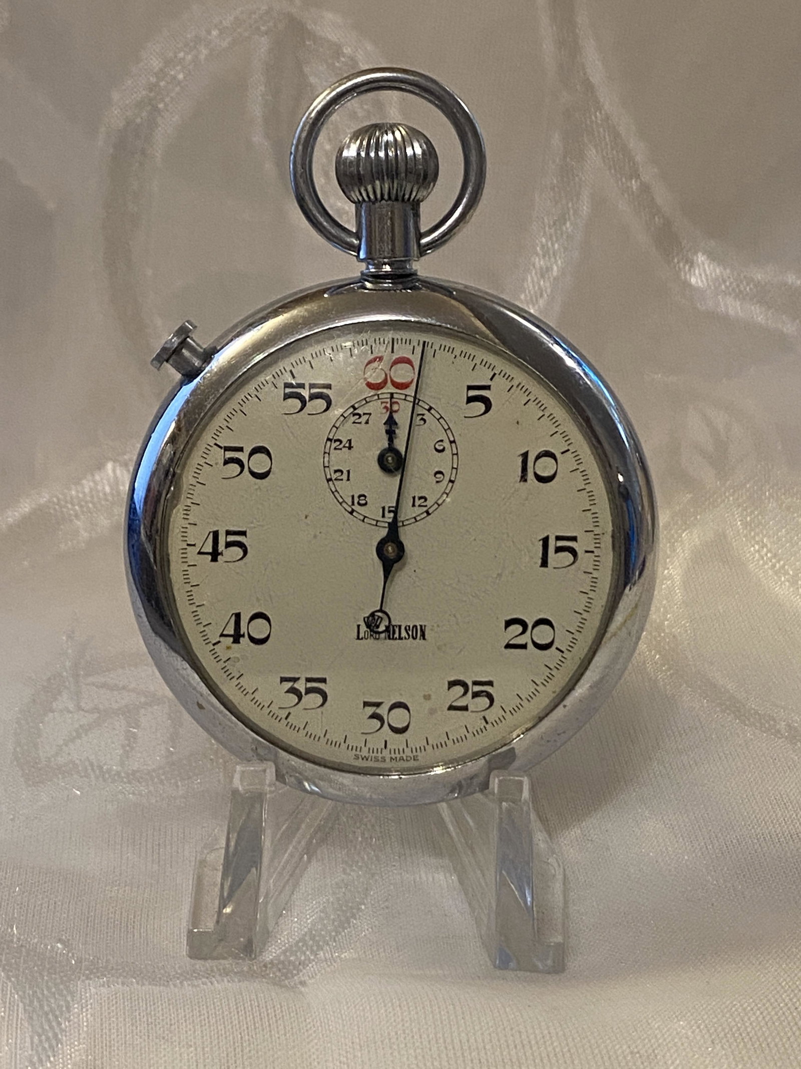 VINTAGE LORD NELSON STOP WATCH: VINTAGE LORD NELSON STOP WATCH. WATCH DOES RUN. PLEASE VIEW ALL PICTURES. A GREAT FIND AND AN EXCELLENT ADDITION TO YOUR COLLECTION.