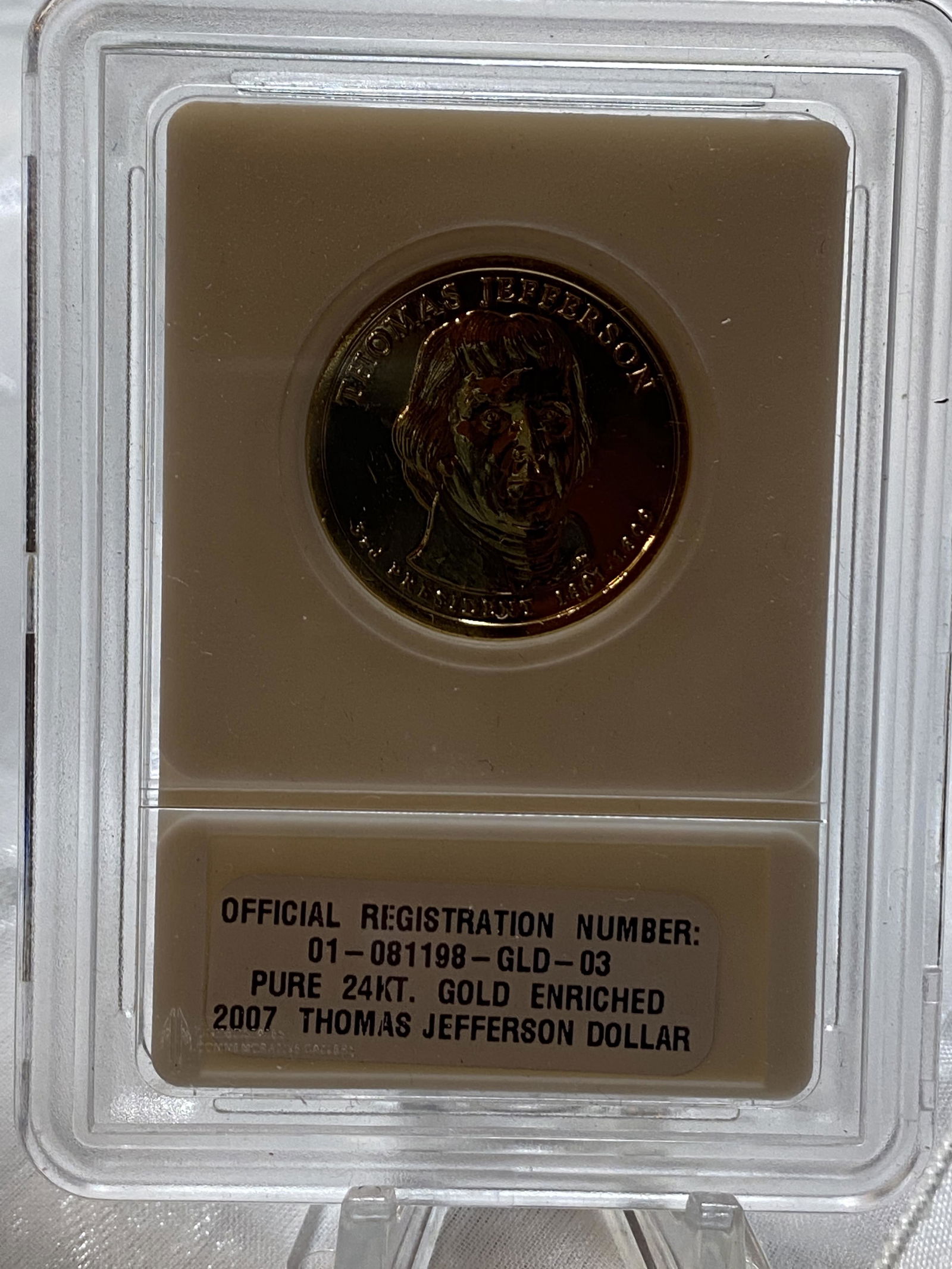 24K GOLD ENRICHED THOMAS JEFFERSON DOLLAR: 24K GOLD ENRICHED THOMAS JEFFERSON DOLLAR. IN A GREAT COLLECTIBLE ADDITION TO YOUR COLLECTION.