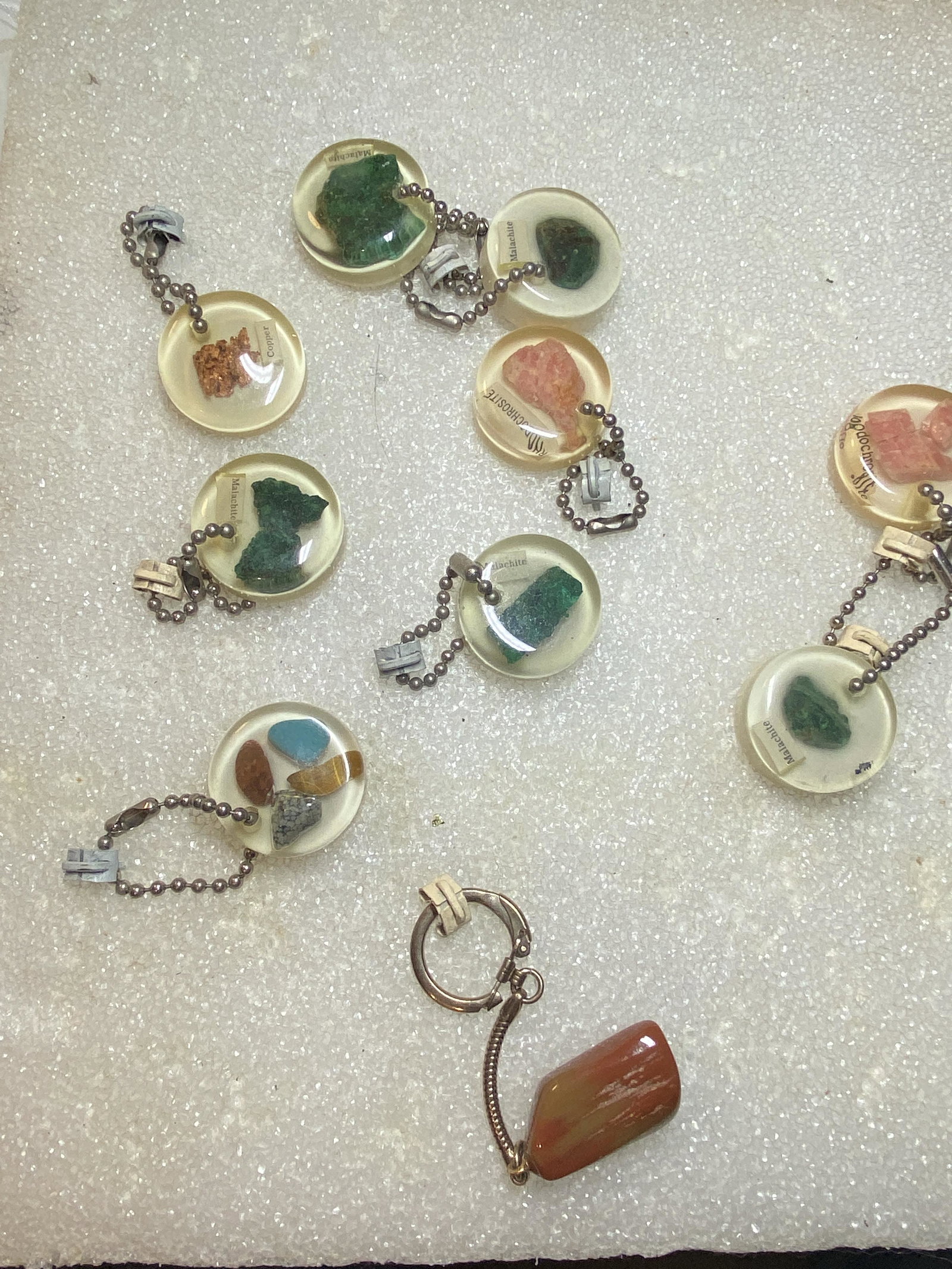LOT OF (10) CABOCHON GEMSTONES INLAID KEYCHAINS: LOT OF (10) CABOCHON GEMSTONES INLAID KEYCHAINS. BEAUTIFUL VINTAGE LOT OF COLLECTIBLE KEY CHAINS. PLEASE VIEW ALL DETAILED PICTURES. A GREAT FIND AND AN EXCELLENT ADDITION TO YOUR COLLECTION.