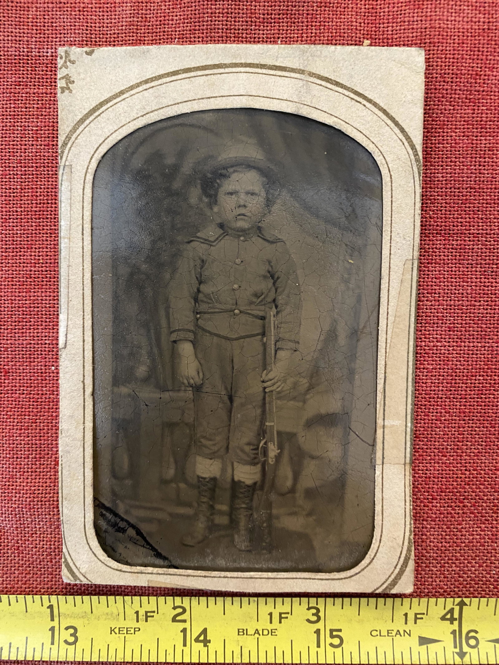 CDV OF CIVIL WAR CONFEDERATE CHILD W/RIFLE & UNIFORM: CDV OF CIVIL WAR CONFEDERATE CHILD W/RIFLE & UNIFORM. IN GOOD OVERALL SHAPE AND CONDITION WITH A BEATIFUL OVERALL PATINA. A GREAT FIND AND AN EXCELLENT ADDITION TO YOUR COLLECTION.