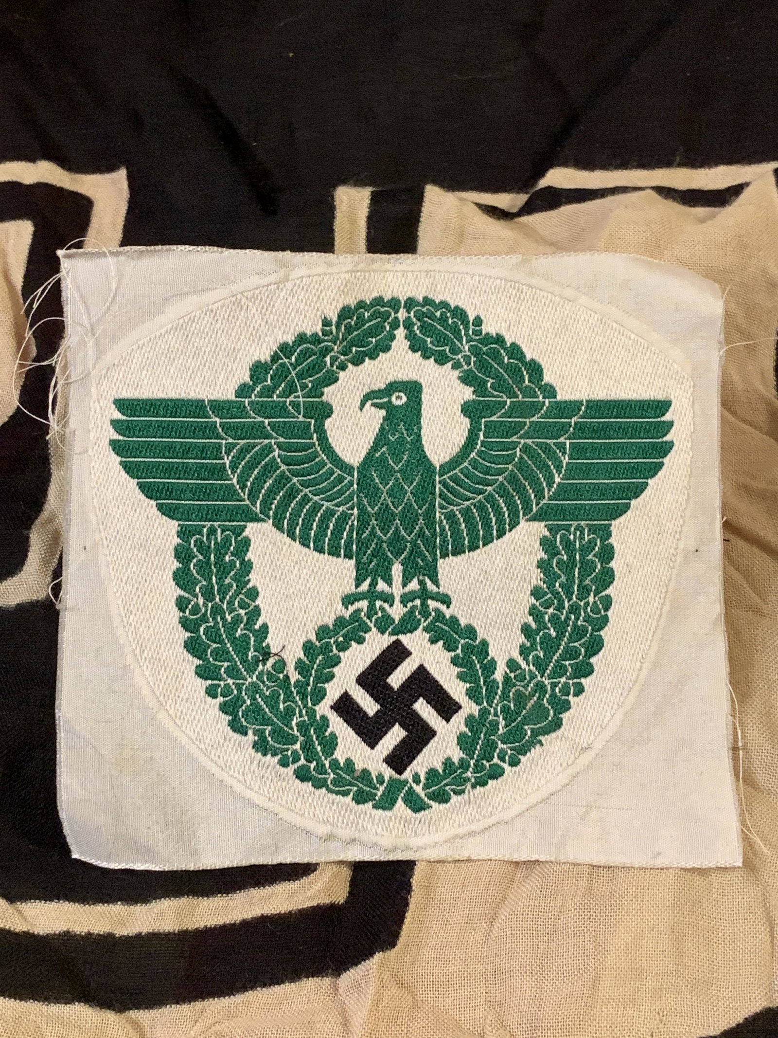 WW2 GERMAN NAZI POLICE SPORTS SHIRT INSIGNIA: WW2 GERMAN NAZI POLICE SPORTS SHIRT INSIGNIA. IN MINT OVERALL SHAPE AND CONDITION. A GREAT FIND AND AN EXCELLENT ADDITION TO YOUR COLLECTION.