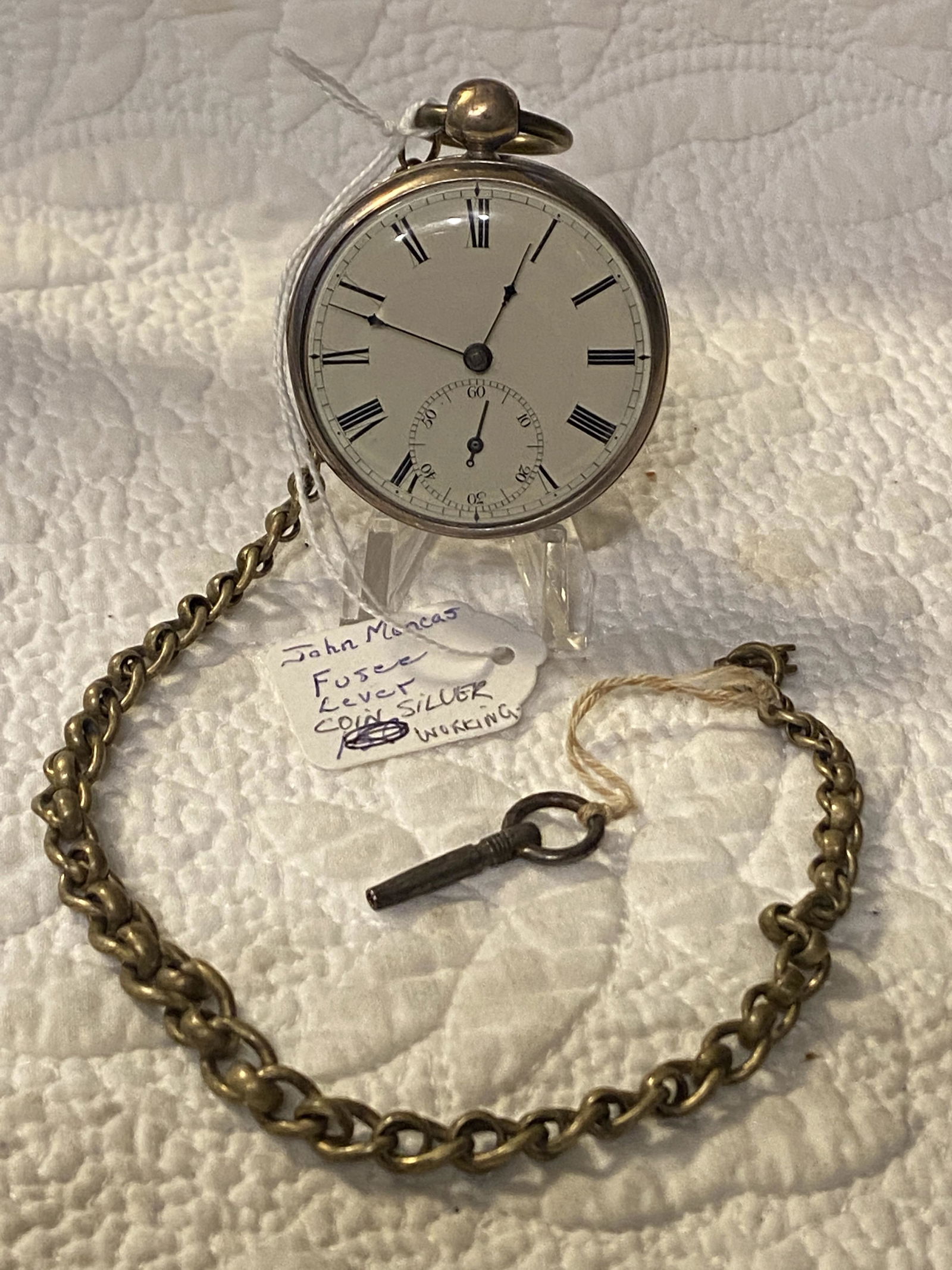 ANTIQUE JOHN MONCAS FUSEE COIN SILVER POCKET WATCH: ANTIQUE JOHN MONCAS FUSEE LEVER COIN SILVER POCKET WATCH WITH WATCH FOB AND KEY. IN EXCELLENT SHAPE AND OVERALL CONDITION. HAS A GREAT LOOK TO IT WITH AN EXCELLENT OVERALL EYE APPEAL. WATCH WORKS. A G