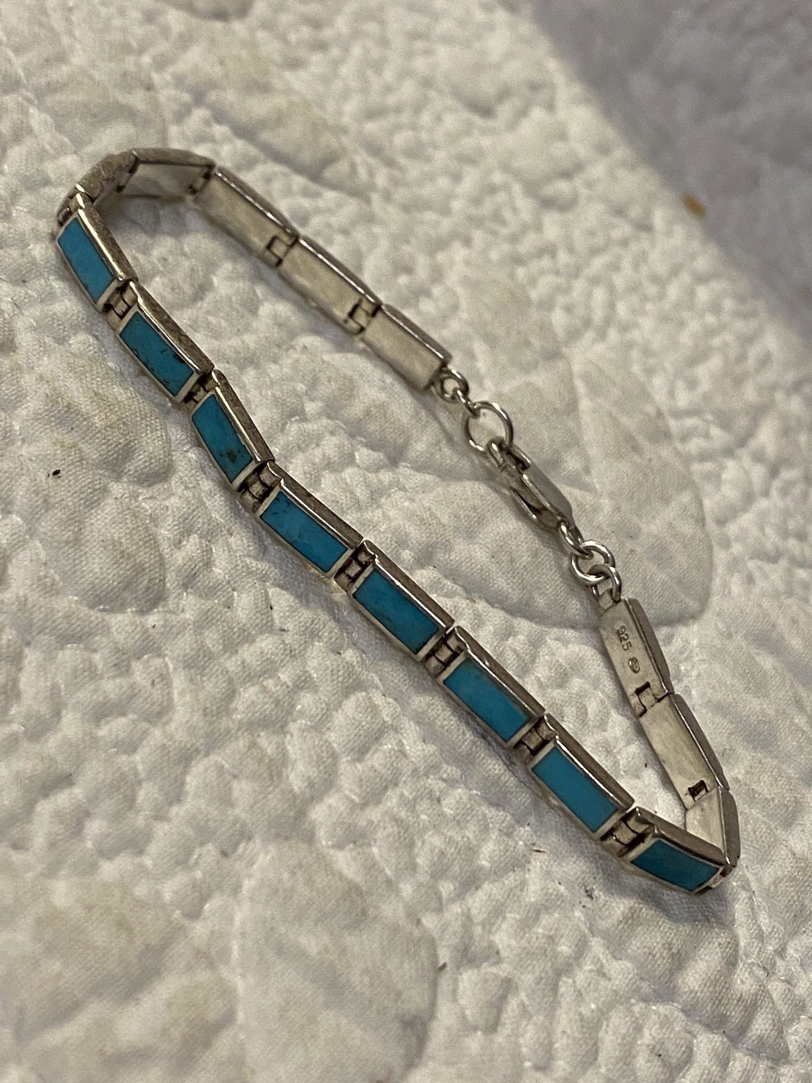 NATIVE AMERICAN STERLING SILVER TURQUOISE TENNIS: NATIVE AMERICAN STERLING SILVER TURQUOISE TENNIS BRACELET. IN GOOD OVERALL SHAPE AND CONDITION. PLEASE VIEW ALL DETAILED PICTURES. A GREAT FIND AND AN EXCELLENT ADDITION TO YOUR COLLECTION.