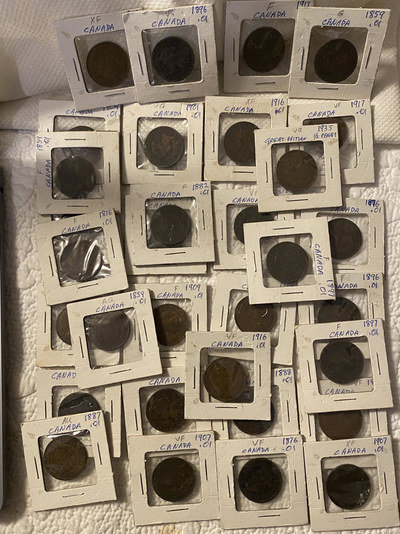 COLLECTION LOT OF (32) ANTIQUE CANADIAN COINS: COLLECTION LOT OF (32) ANTIQUE CANADIAN COINS. PLEASE VIEW PICTURES. A GREAT FIND AND AN EXCELLENT ADDITION TO YOUR COLLECTION.