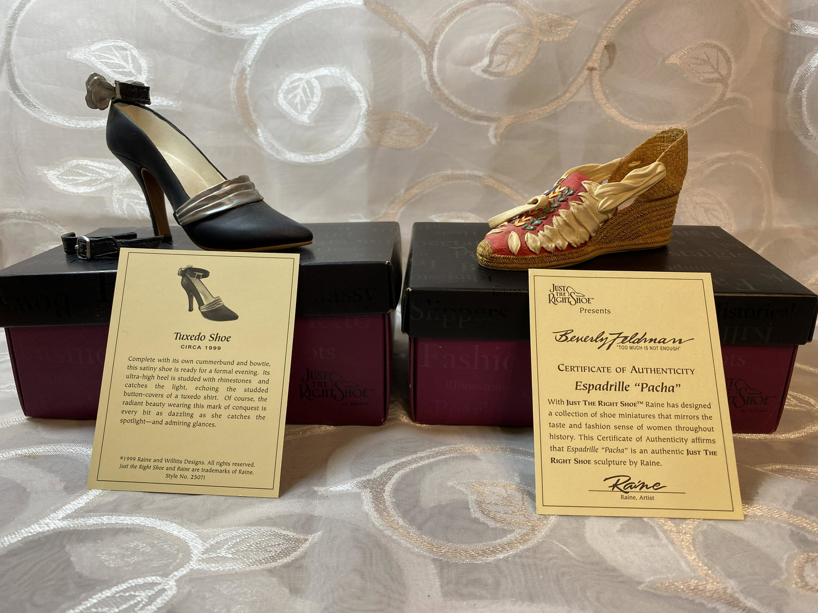 LOT OF (2) MINIATURE THE RIGHT SHOE COLLECTIBLE: LOT OF (2) MINIATURE THE RIGHT SHOE COLLECTIBLE. WITH JUST THE RIGHT SHOE RAINE HAS DESIGNED A COLLECTION OF SHOE MINIATURES THAT MIRRORS THE TASTE AND FASHION SENSE OF WOMEN THROUGHOUT HISTORY. A GRE