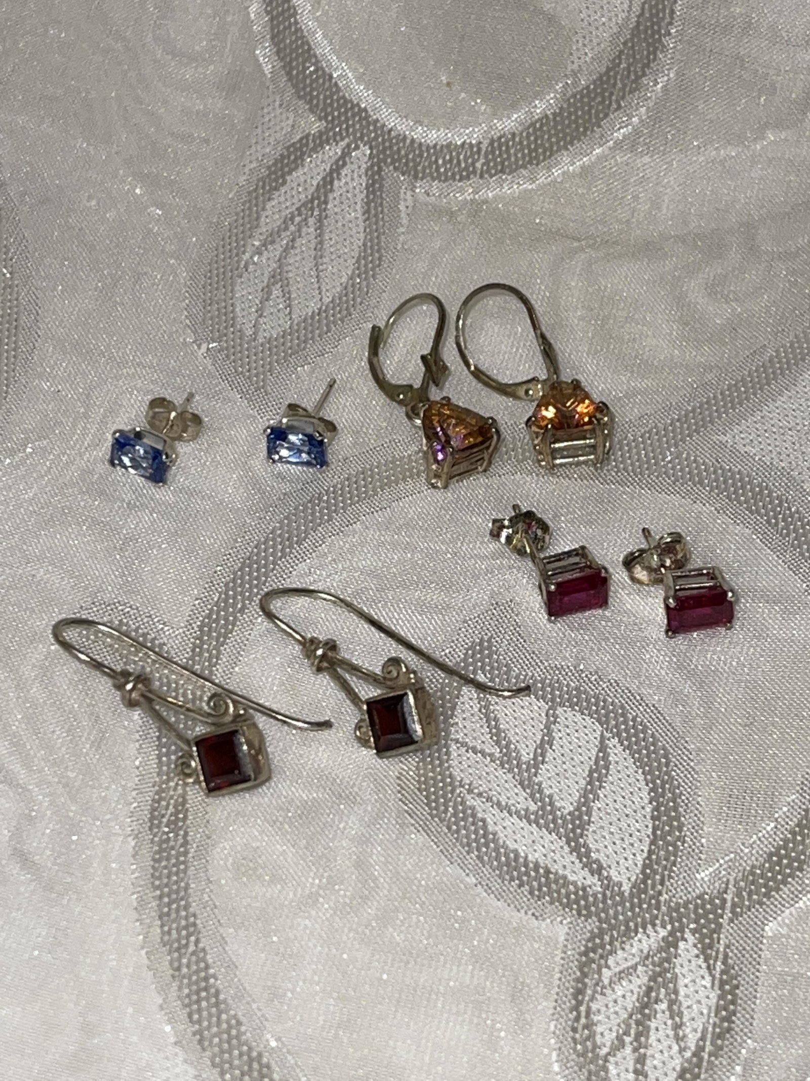 STERLING SILVER PAIR OF (4) GEMSTONE EARRINGS: STERLING SILVER PAIR OF (4) GEMSTONE EARRINGS. SOLD AS A LOT. ALL FOR ONE MONEY. A GREAT FIND AND AN EXCELLENT ADDITION TO YOUR COLLECTION.