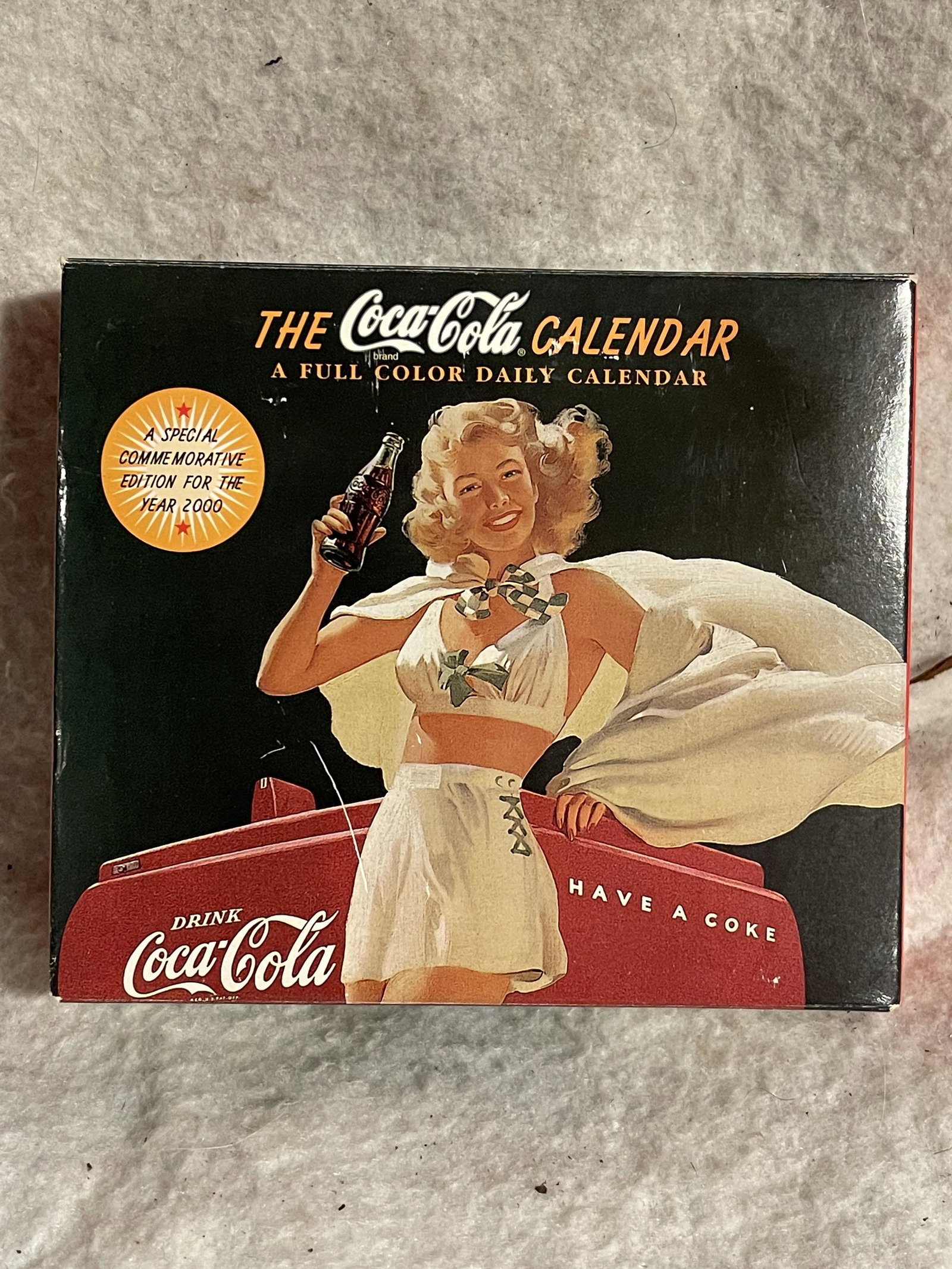 VINTAGE THE COCA COLA CALENDAR IN BOX: VINTAGE THE COCA COLA CALENDAR IN BOX. A GREAT FIND AND AN EXCELLENT ADDITION TO YOUR COLLECTION.