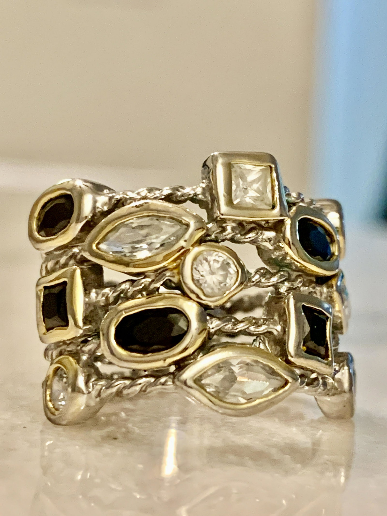DESIGNER STERLING SILVER MULTI-GEMSTONE COCKTAIL RING: DESIGNER STERLING SILVER MULTI-GEMSTONE COCKTAIL RING SZ 7.5. IN GOOD OVERALL SHAPE AND CONDITION. HAS A GREAT LOOK TO IT WITH AN EXCELLENT OVERALL EYE APPEAL. A GREAT FIND AND AN EXCELLENT ADDITION T