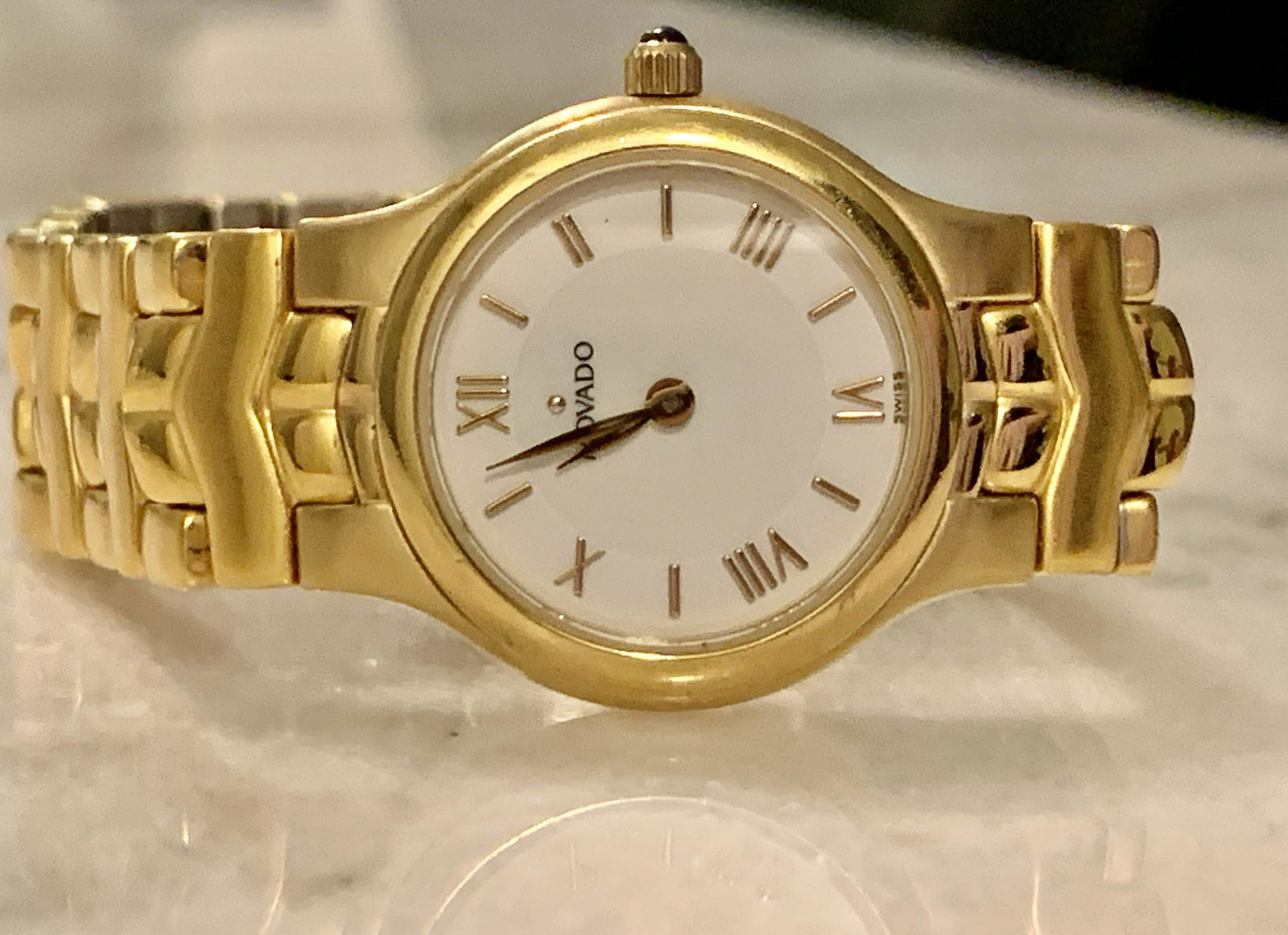 LADIES MOVADO GOLD TONE WRISTWATCH: LADIES MOVADO GOLD TONE WRISTWATCH. IN GOOD OVERALL SHAPE AND CONDITION. FRESH ESTATE FIND.