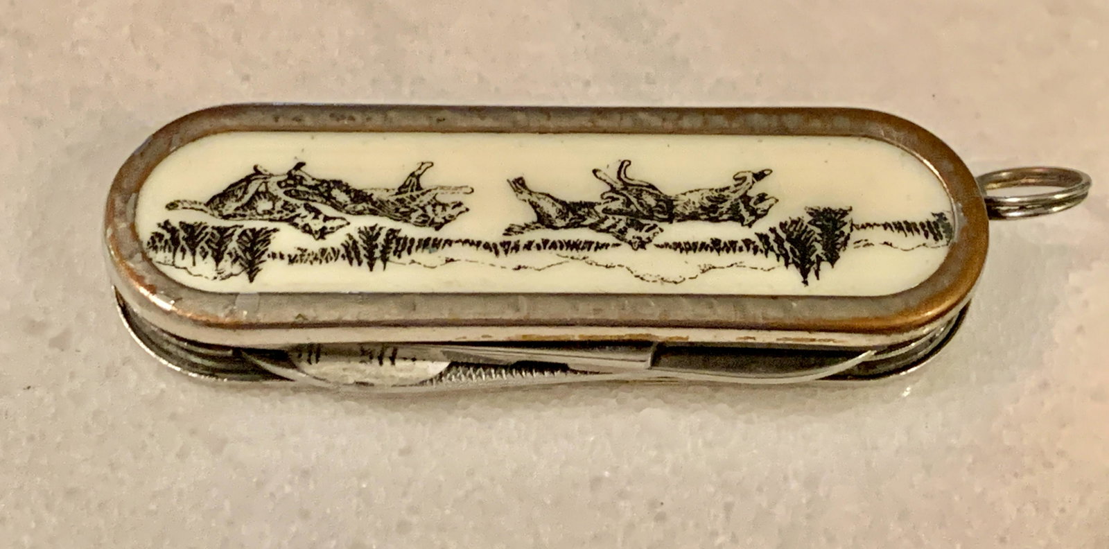 VINTAGE HUNTING MOTIF MULTI-TOOL POCKET KNIFE: VINTAGE HUNTING MOTIF MULTI-TOOL POCKET KNIFE. IN MINT OVERALL SHAPE AND CONDITION. A GREAT FIND AND AN EXCELLENT ADDITION TO YOUR COLLECTION.