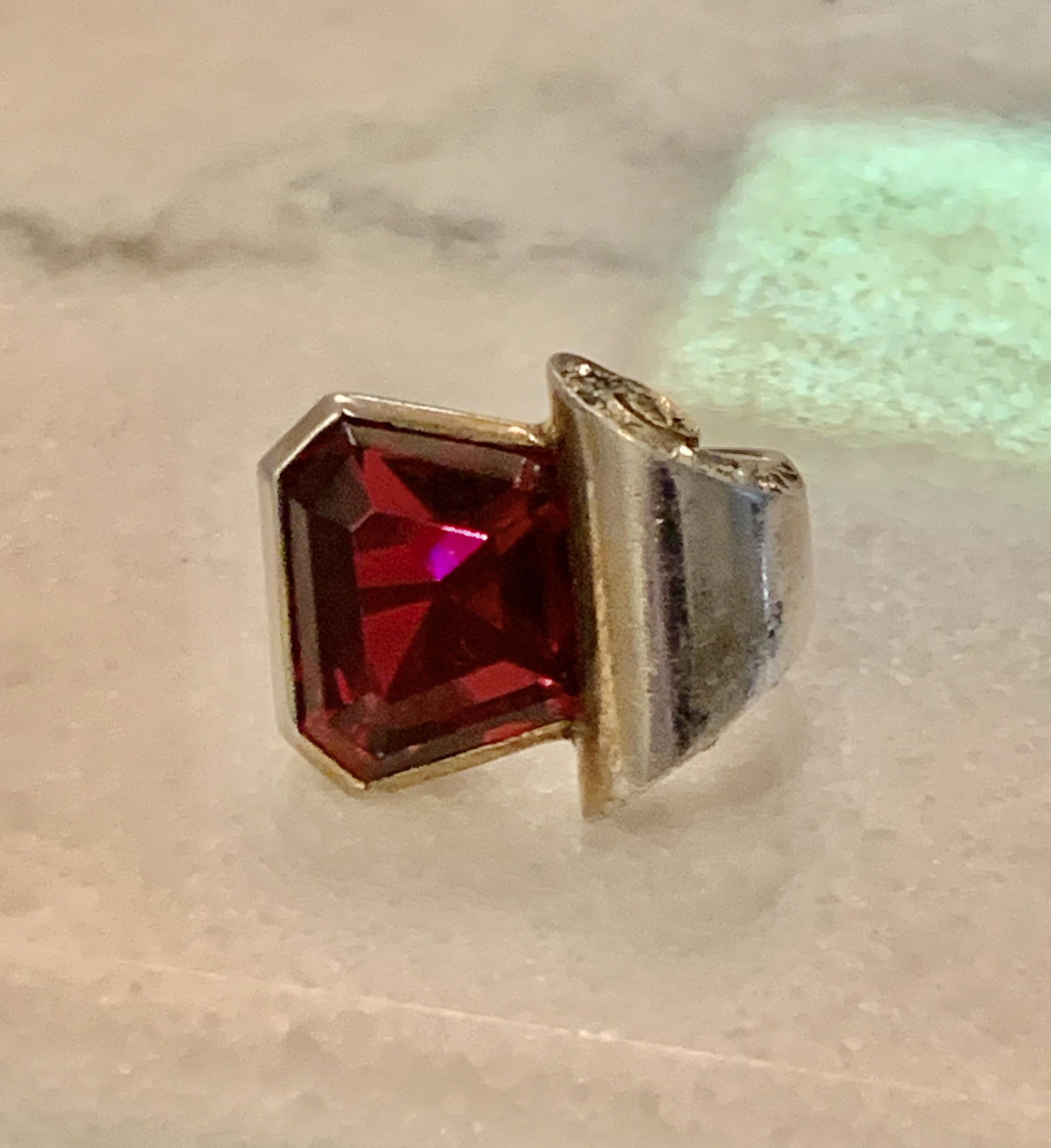 RETRO DESIGN STERLING SILVER COCKTAIL RUBY RING: RETRO DESIGN STERLING SILVER COCKTAIL RUBY RING. RING IS A SIZE 7. HAS A GREAT LOOK TO IT WITH AN EXCELLENT OVERALL EYE APPEAL. A GREAT FIND AND AN EXCELLENT ADDITION TO YOUR COLLECTION.