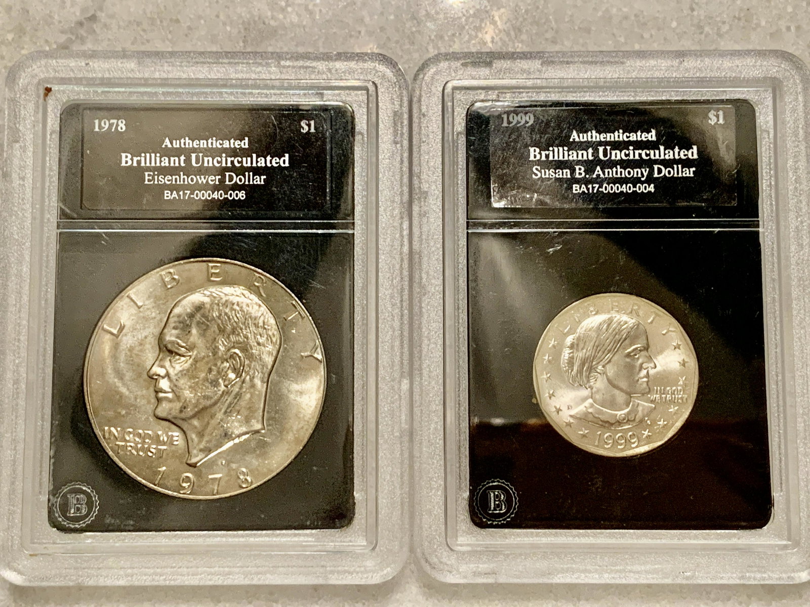 LOT OF (2) EISENHOWER & SUSAN B. ANTHONY CERTIFIED: LOT OF (2) EISENHOWER & SUSAN B. ANTHONY CERTIFIED DOLLARS. PLEASE VIEW ALL DETAILED PICTURES.
