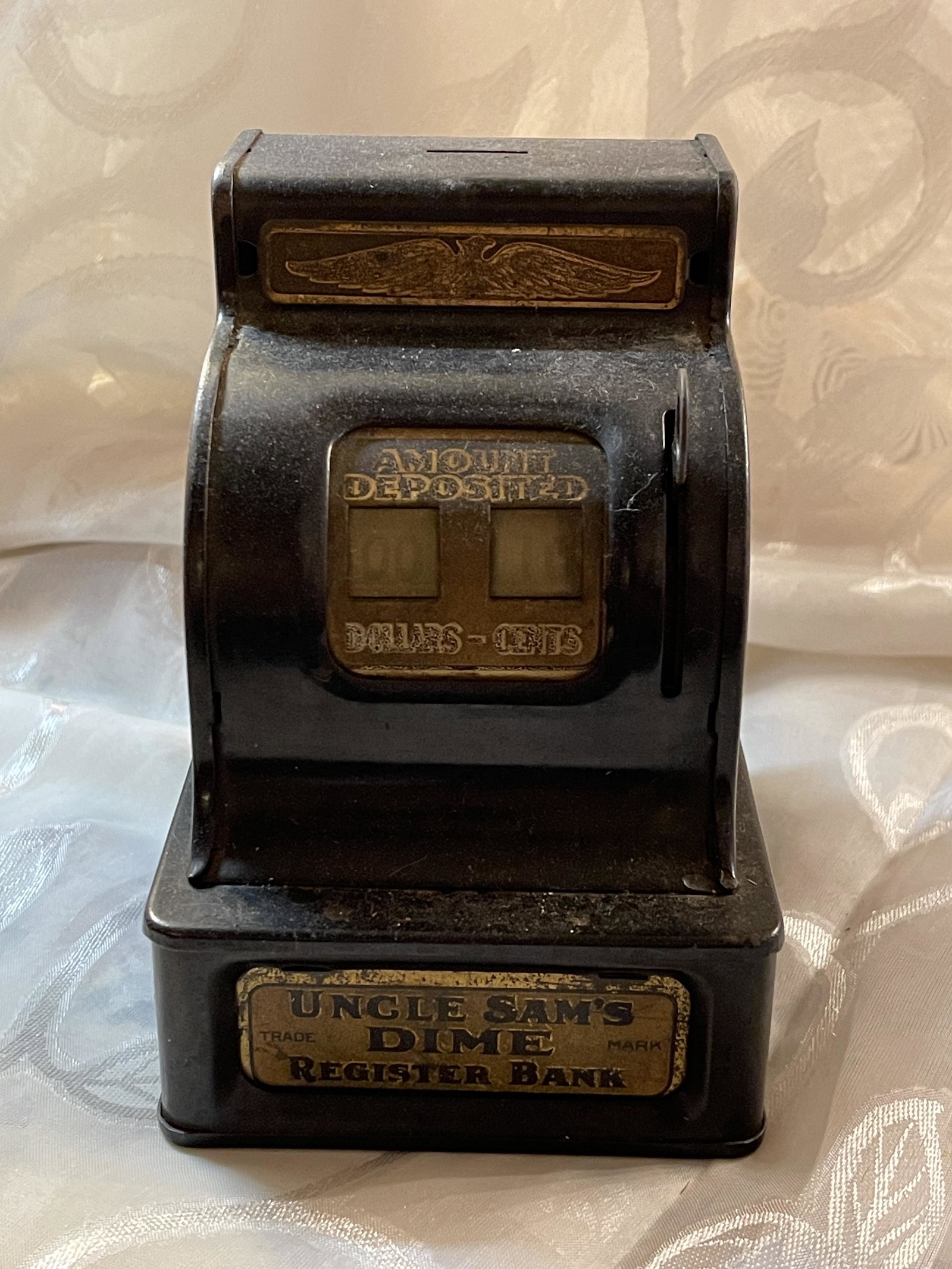 VTG DURABLE TOY COLLECTIBLE CASH REGISTER COIN BANK: VTG DURABLE TOY COLLECTIBLE CASH REGISTER COIN BANK. IN GOOD OVERALL SHAPE AND CONDITION. A GREAT FIND AND AN EXCELLENT ADDITION TO YOUR COLLECTION.