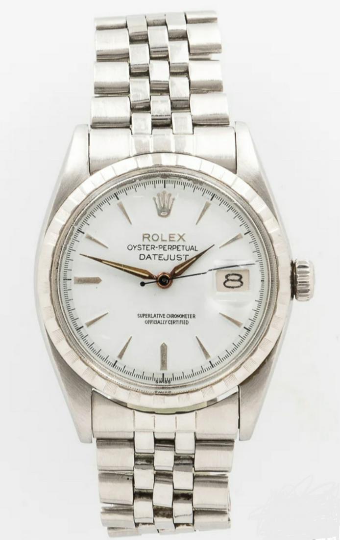 ROLEX C.1957 STAINLESS STEEL MENS WATCH REF#: 6605: ROLEX C.1957 STAINLESS STEEL MENS WATCH REF#: 6605. IN MINT OVERALL SHAPE AND CONDITION. KEEPING GREAT TIME. COMES FROM A WATCH COLLECTION. HAS A BEAUTIFUL LACQUERED WHITE DIAL WITH APPLIED INDICES, M