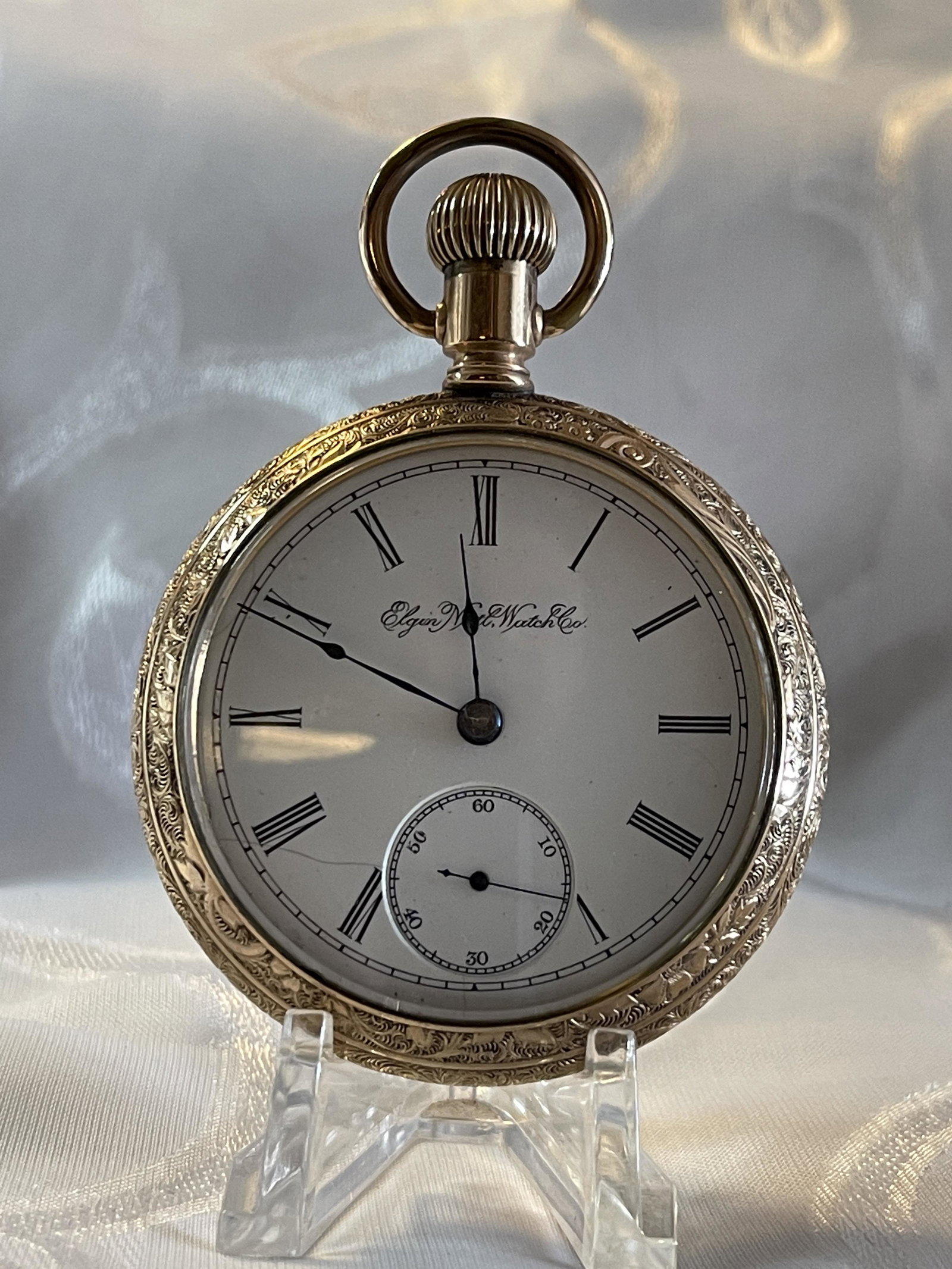ELGIN NATL. WATCH CO. MENS POCKET WATCH W/TAG: ELGIN NATL. WATCH CO. MENS POCKET WATCH W/TAG. STILL HAS THE ORIGINAL TAG ON THE INSIDE BACK CASE - VIEW PICTURES. APPEARS TO BE IN GOOD WORKING ORDER. A GREAT FIND AND AN EXCELLENT ADDITION TO YOUR C