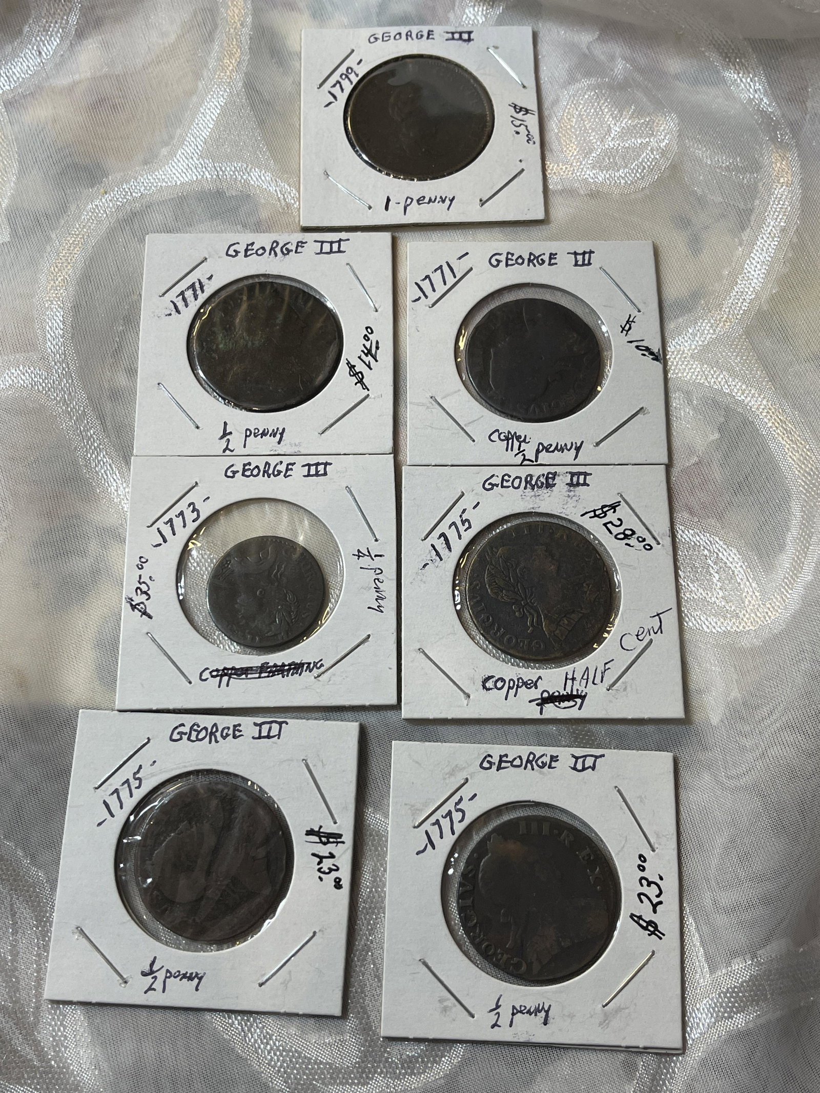 ANTIQUE LOT OF (7) 1700s BRITISH GEORGE III COINS: ANTIQUE LOT OF (7) 1700s BRITISH GEORGE III COINS. SOLD AS FOUND, AS A LOT. PLEASE VIEW ALL DETAILED PICTURES. A GREAT FIND AND AN EXCELLENT ADDITION TO YOUR COLLECTION.