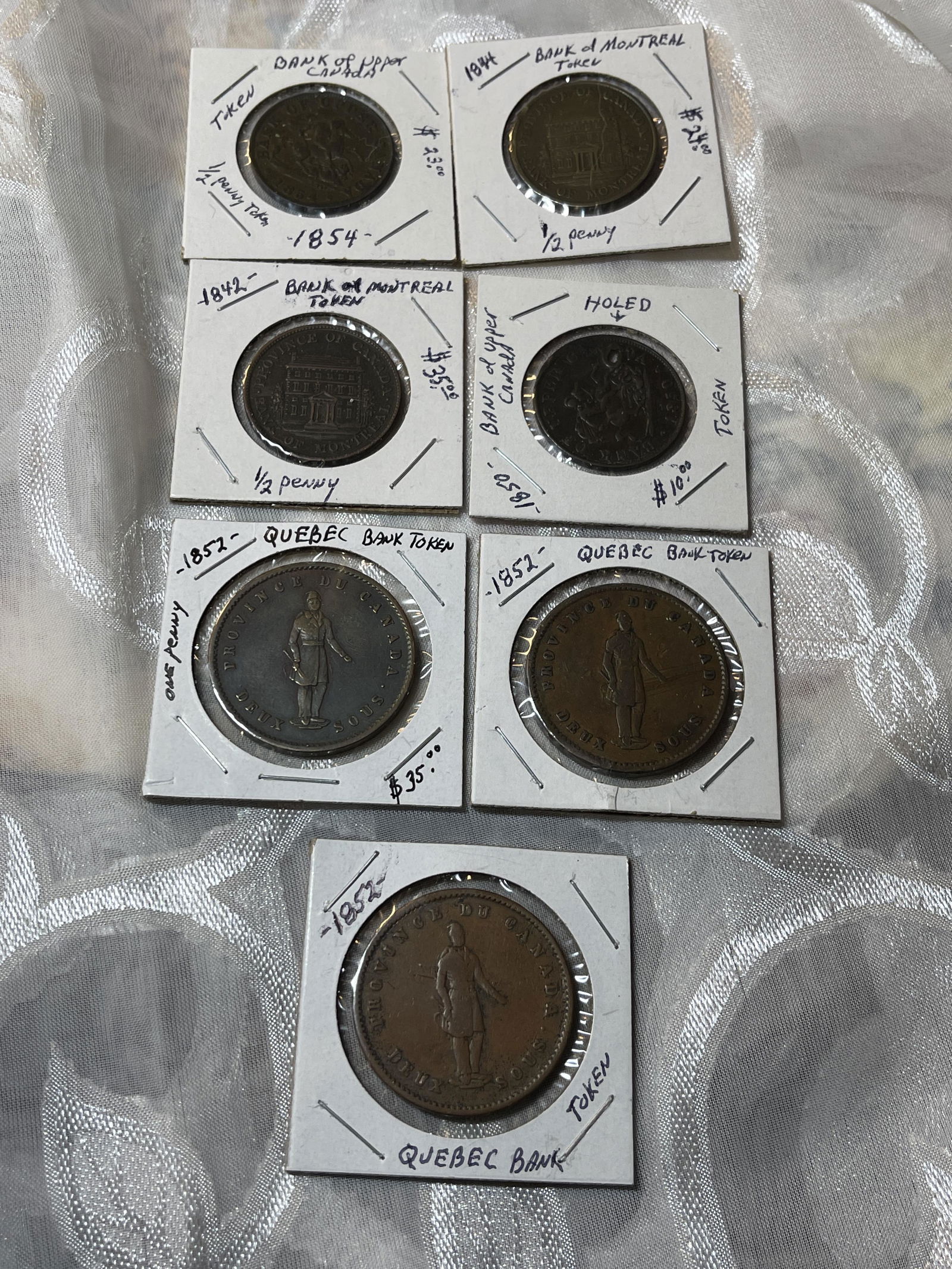 ANTIQUE LOT OF (7) CANADIAN TOKENS FROM 1800'S (1 of 6)