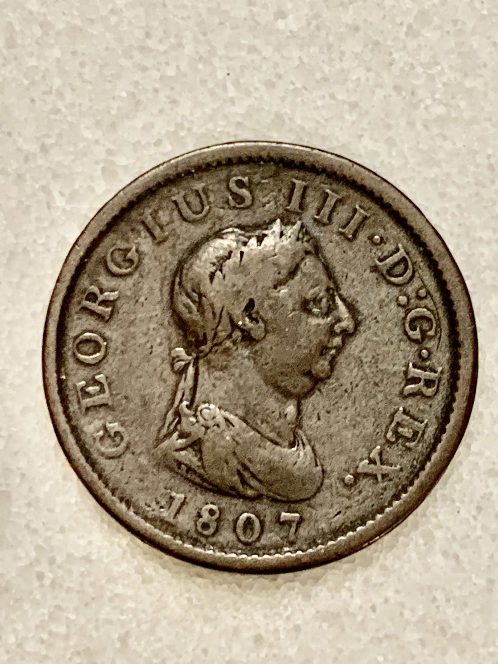 DATED 1807 GEORGIUS III D.G.REX COIN: DATED 1807 GEORGIUS III D.G.REX COIN. APPREAS TO BE IN GOOD AGE IN RESPECT OF THE AGE. A GREAT FIND AND AN EXCELLENT ADDITION TO YOUR COLLECTION.