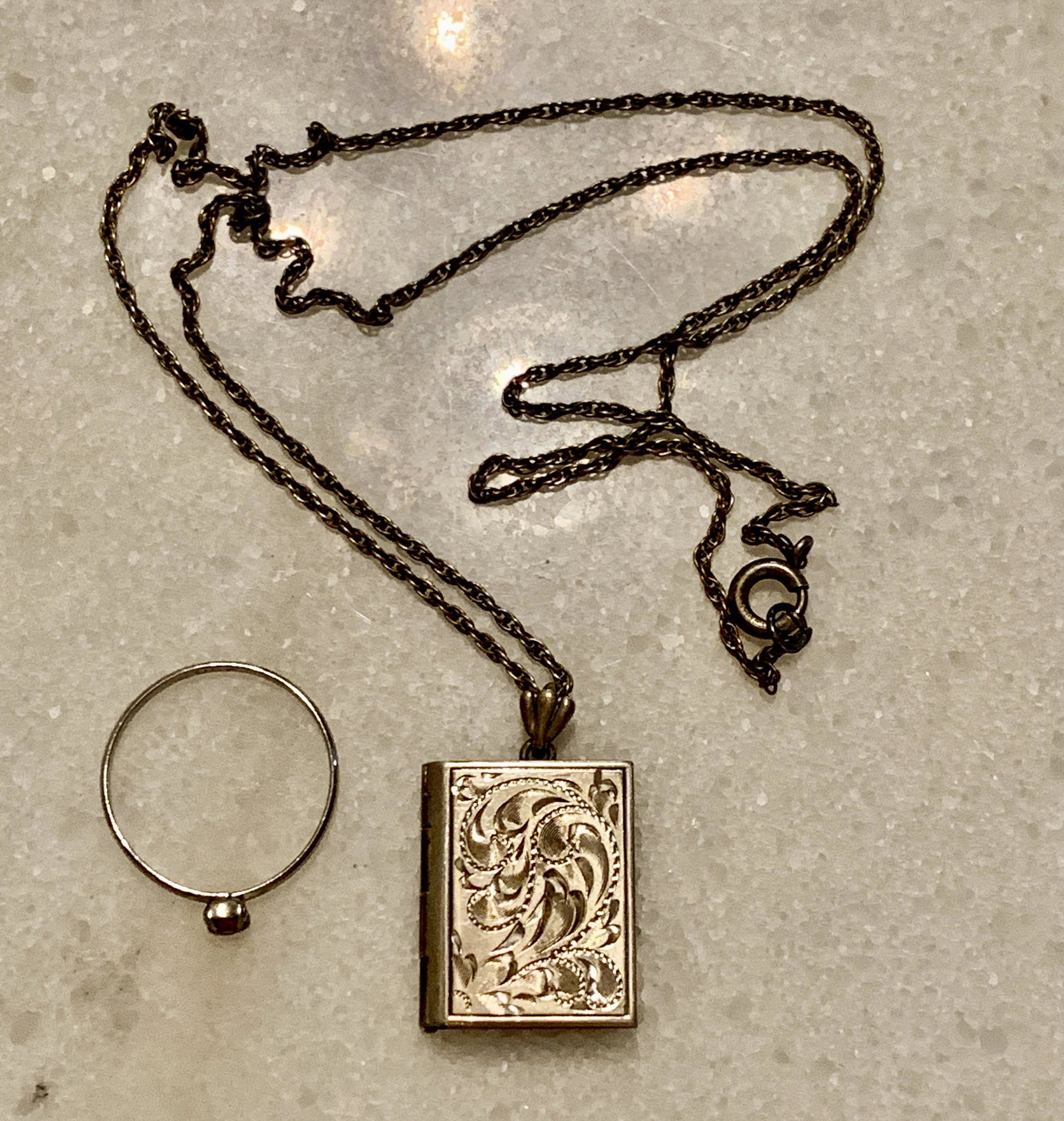 ESTATE STERLING SILVER LOT OF LOCKET NECKLACE & RING: ESTATE STERLING SILVER LOT OF LOCKET NECKLACE & RING. IN MINT OVERALL SHAPE AND CONDITION. A GREAT FIND AND AN EXCELLENT ADDITION TO YOUR COLLECTION.