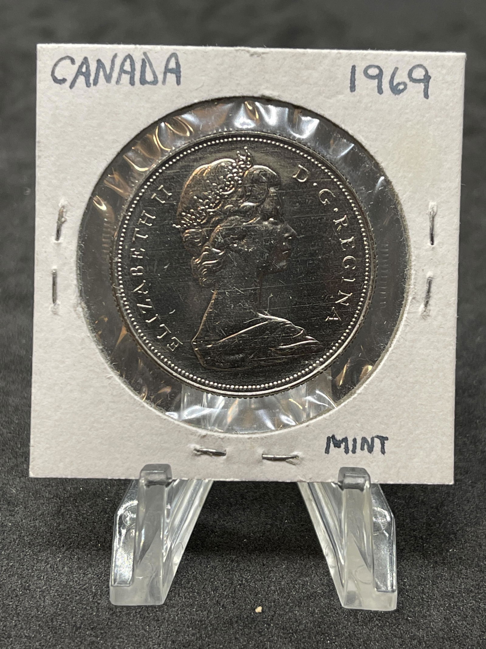 1969 CANADIAN SILVER DOLLAR - MINT (1 of 2)