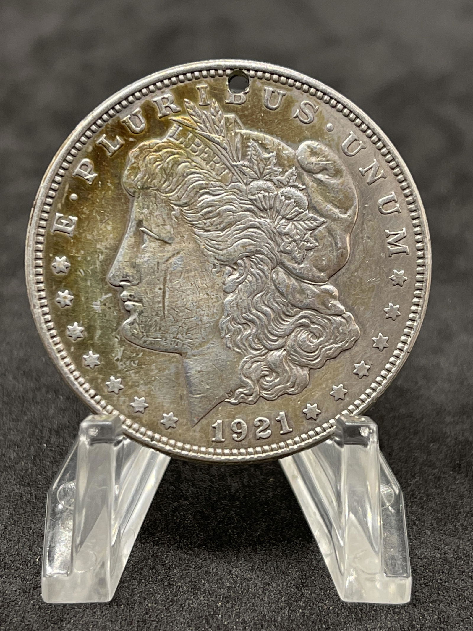 1921 MORGAN SILVER DOLLAR - HOLED: 1921 MORGAN SILVER DOLLAR - HOLED. PLEASE VIEW PICTURES. BEAUTIFUL COIN.