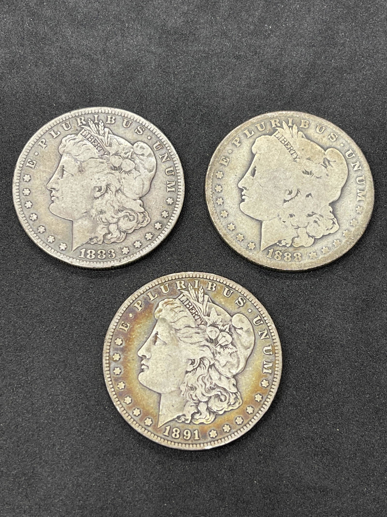 (3) COINS - MORGAN SILVER DOLLARS WITH MINT MARKS (1 of 2)