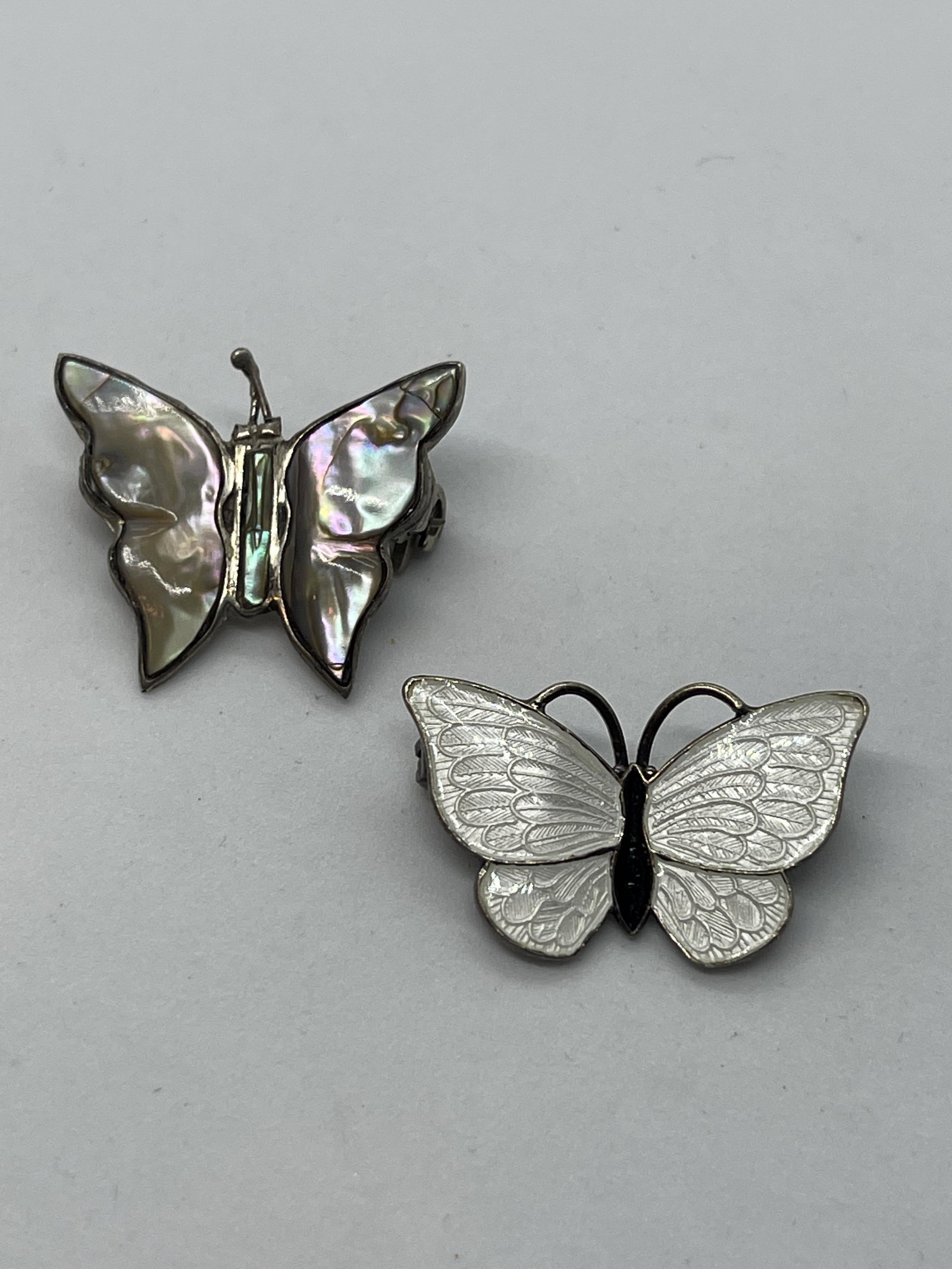 (2) STERLING SILVER ENAMEL/MARCASITE BUTTERFLY BROOCHES: (2) STERLING SILVER ENAMEL/MARCASITE BUTTERFLY BROOCHES. SOLD AS A LOT. PLEASE VIEW PICTURES. A GREAT FIND.