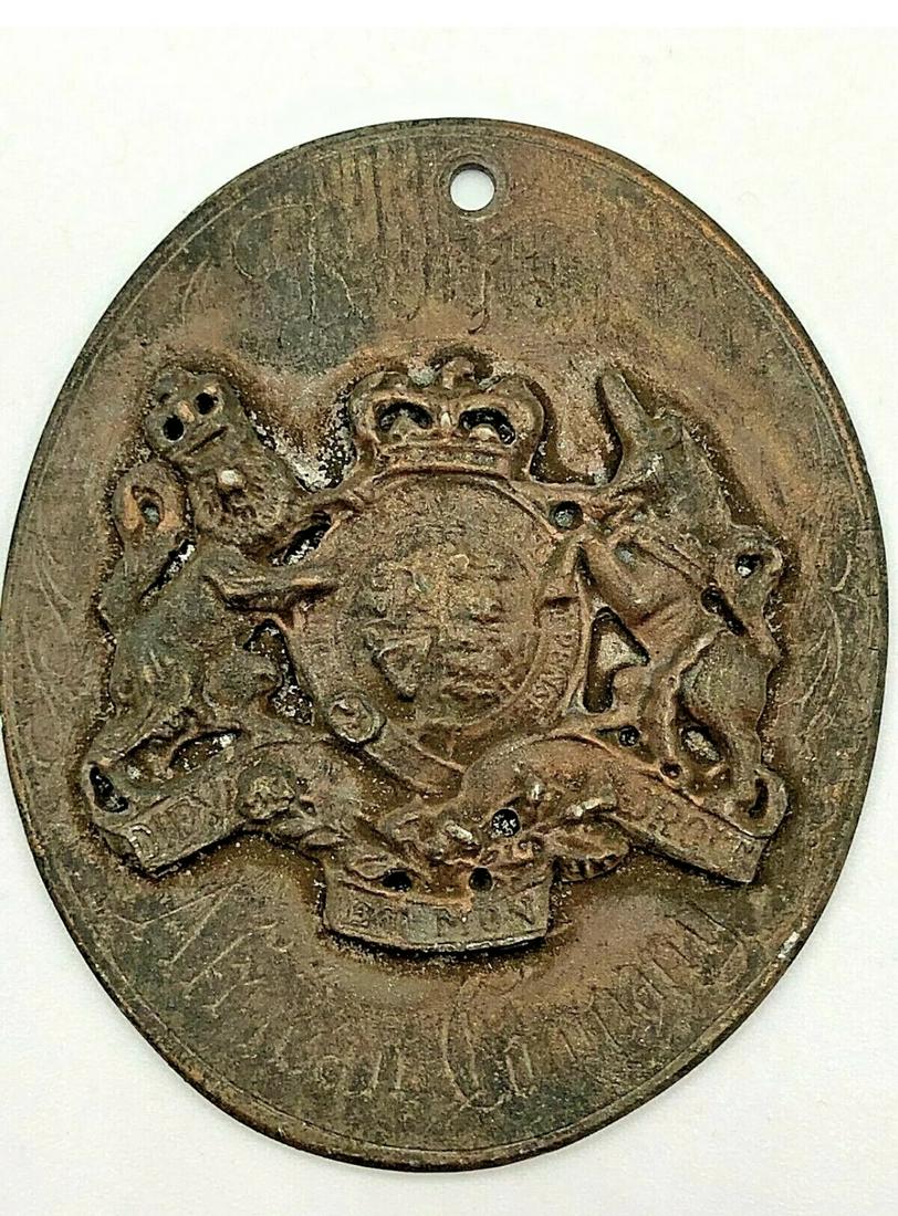 DATED 1725 ROYAL AFRICAN CO. BLACK LABOR SLAVE TAG: DATED 1725 ROYAL AFRICAN CO. BLACK LABOR SUPPLY METAL SLAVE TAG. THIS IS A VERY RARE FIND. IN MINT OVERALL SHAPE AND CONDITION WITH A BEAUTIFUL OVERALL PATINA. APPEARS TO BE WELL USED. A GREAT FIND AN