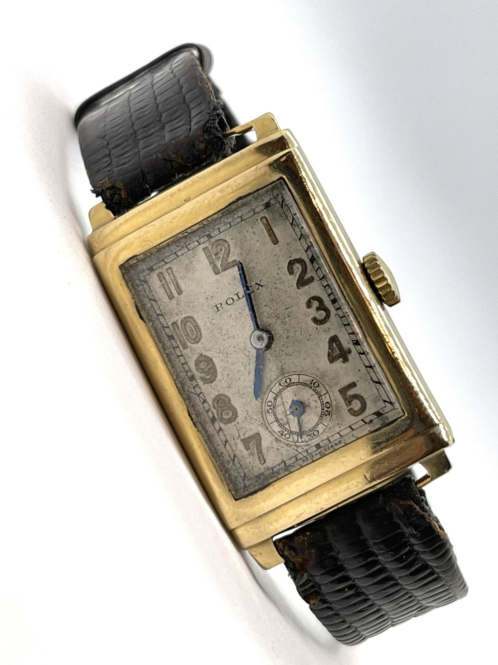 1936 9K GOLD ROLEX TANK STYLE HAND-WIND WRISTWATCH: DATED 1936 9K GOLD ROLEX HAND-WIND TANK STYLE WRISTWATCH. IN MINT OVERALL SHAPE AND CONDITION. HAS A GREAT LOOK TO IT WITH AN EXCELLENT OVERALL EYE APPEAL. WATCH CURRENTLY IS WORKING AND KEEPING TIME.