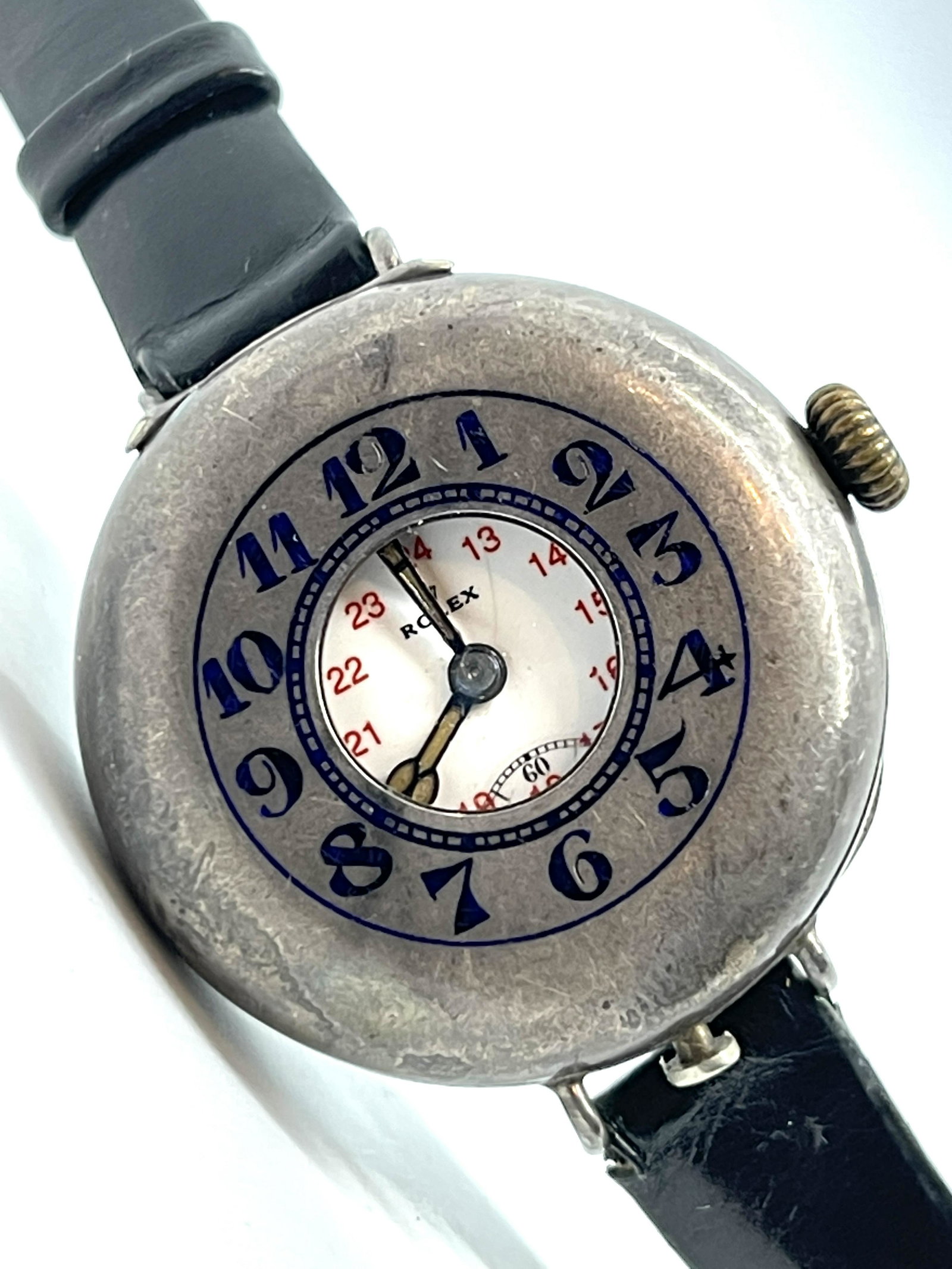 RARE ROLEX STERLING SILVER DEMI-HUNTER WATCH: RARE ROLEX STERLING SILVER DEMI-HUNTER WATCH. THIS IS A VERY RARE FIND. IN GOOD OVERALL SHAPE AND CONDITION AND KEEPING TIME. BLUE ENAMEL ARABIC NUMERAL HINGED OUTER CASE, WHITE ARABIC NUMERAL DIAL WI