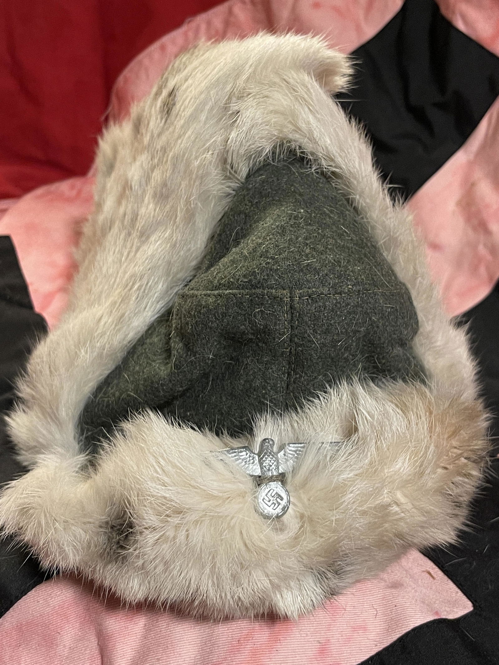 RARE WW2 GERMAN HEER WINTER FUR CAP WITH EAGLE INSIGNIA: RARE WW2 GERMAN HEER WINTER FUR CAP WITH EAGLE INSIGNIA. IN MINT OVERALL SHAPE AND CONDITION. HAS A GREAT LOOK TO IT WITH AN EXCELLENT OVERALL EYE APPEAL. BEAUTIFUL CAP AND WELL USED. PLEASE VIEW ALL