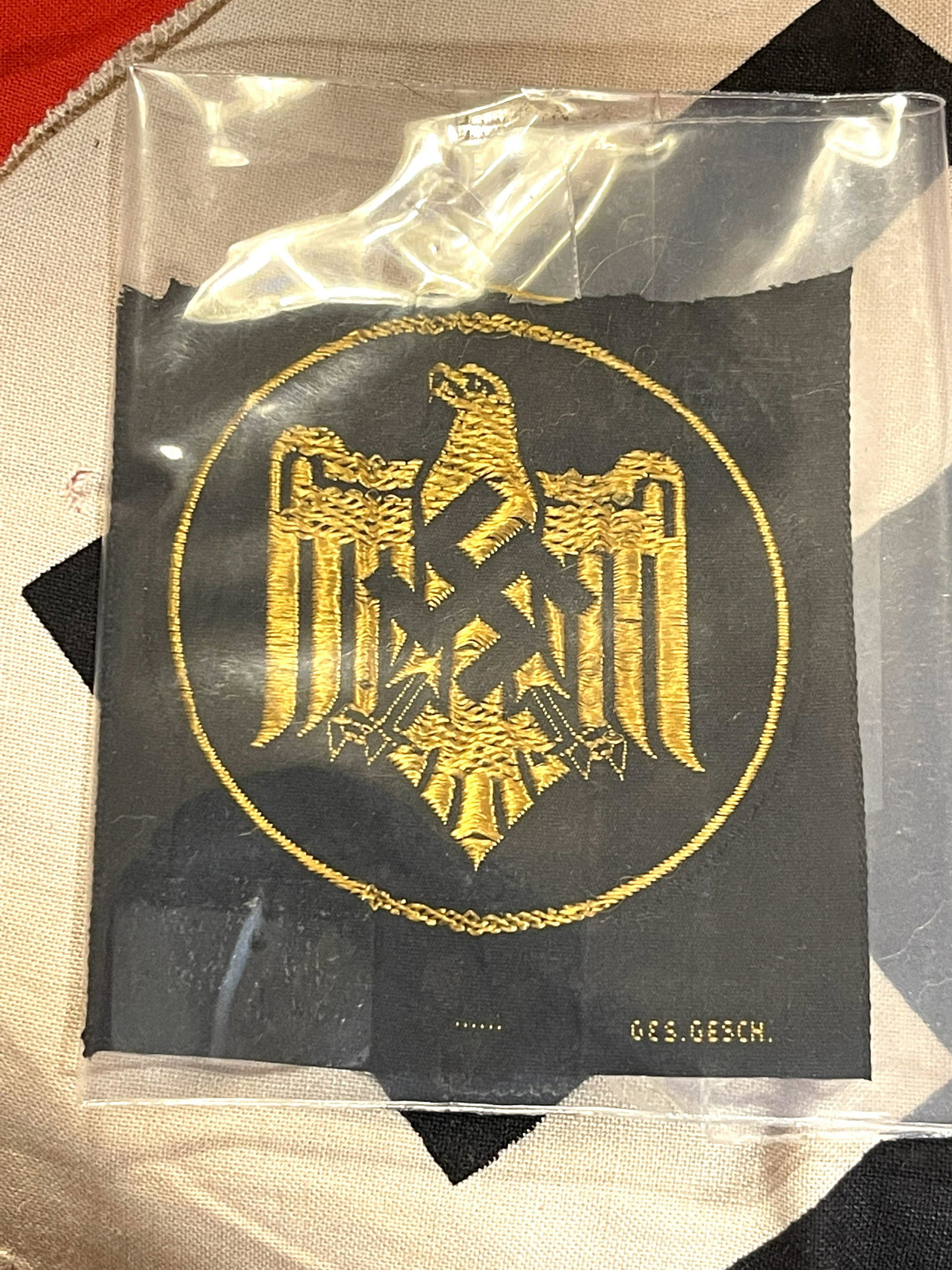 WW2 GERMAN NATL. SPORTS ASSN. VEST EAGLE CLOTH INSIGNIA: WW2 GERMAN NATL. SPORTS ASSN. VEST EAGLE CLOTH INSIGNIA. IN MINT OVERALL SHAPE AND CONDITION. HAS A GREAT LOOK TO IT WITH AN EXCELLENT OVERALL EYE APPEAL. A GREAT FIND AND AN EXCELLENT ADDITION TO YOU
