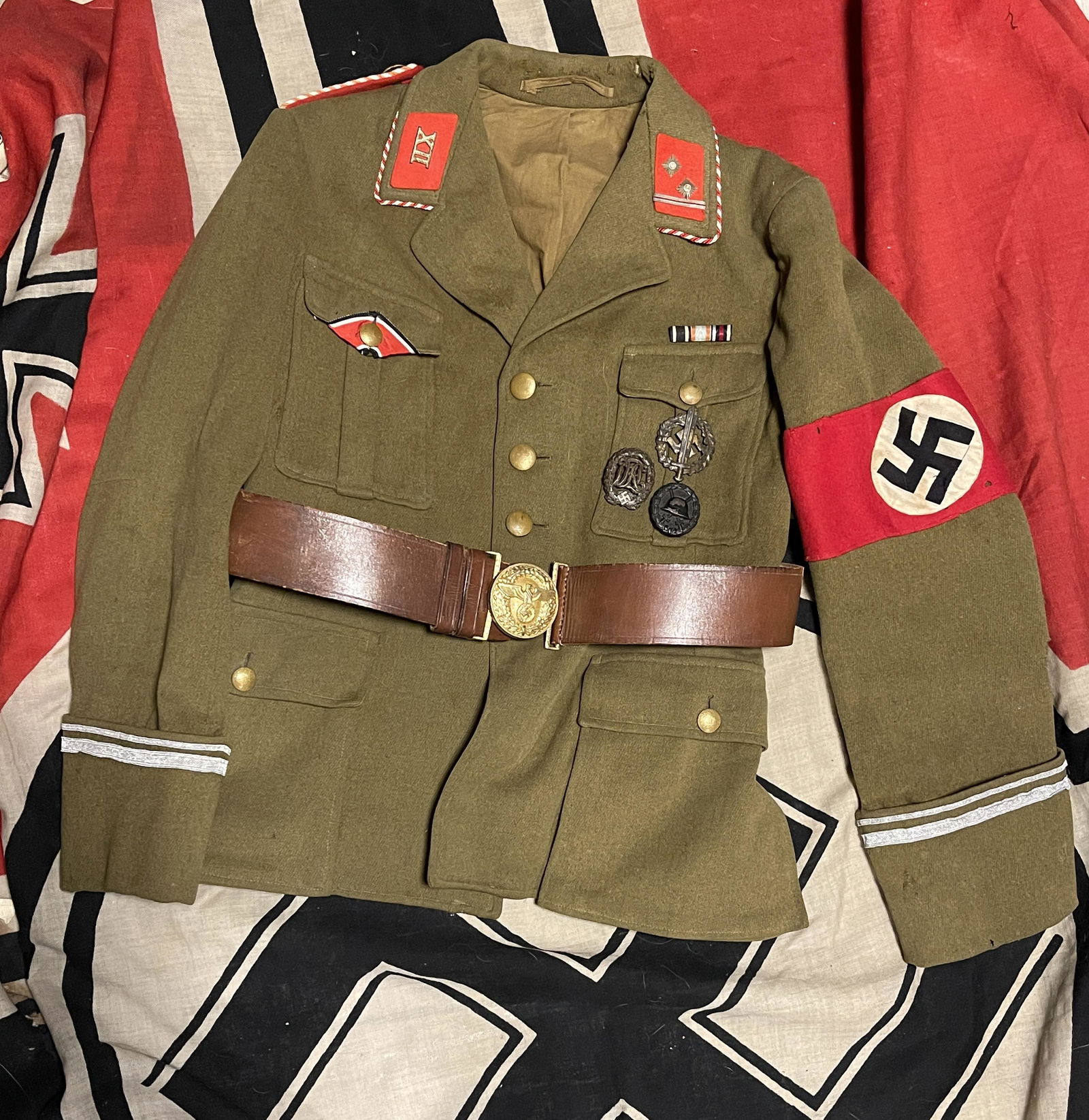 RARE WW2 GERMAN POLITICAL LEADERS UNIFORM JACKET: RARE WW2 GERMAN POLITICAL LEADERS UNIFORM JACKET. THIS IS A VERY RARE FIND. WAS BROUGHT BACK HOME BY A VET. IT IS IN MINT OVERALL SHAPE AND CONDITION WITH A BEAUTIFUL OVERALL PATINA. VERY GENTLY USED