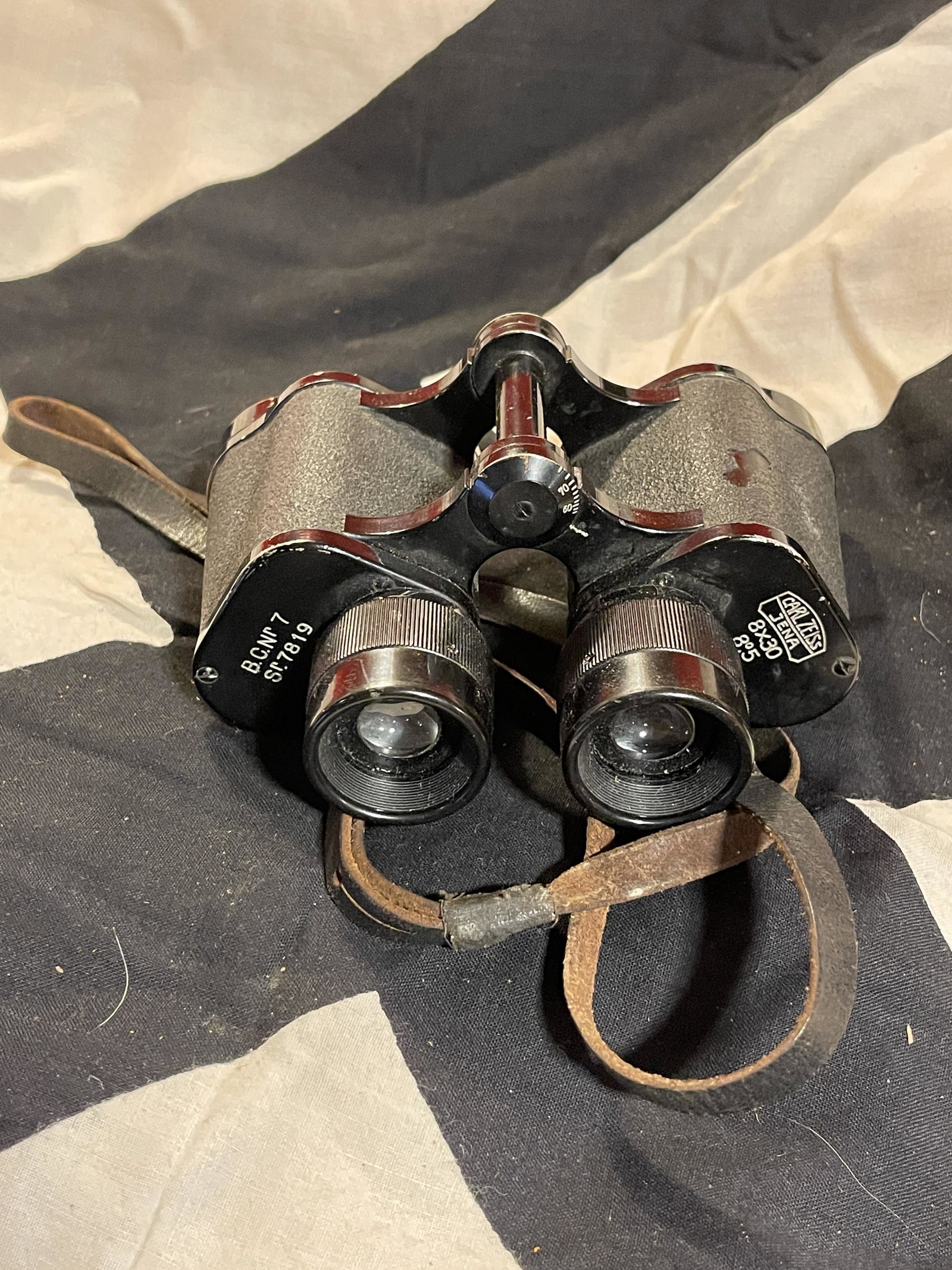 WW2 GERMAN OFFICER BINOCULARS BY CARL ZEISS: WW2 GERMAN OFFICER BINOCULARS BY CARL ZEISS 8X30 FOCUS. IN MINT OVERALL SHAPE AND CONDITION. VERY WELL MADE AND VERY WELL CARED FOR. PLEASE VIEW ALL DETAILED PICTURES. A GREAT FIND AND AN EXCELLENT AD