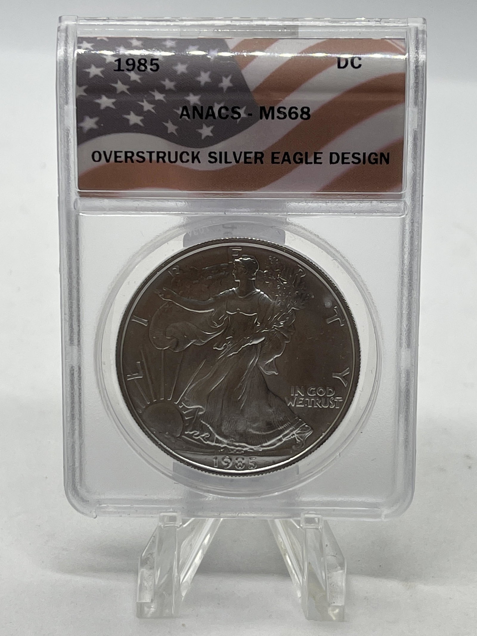 ANACS - MS68 1985 OVERSTRUCK SILVER EAGLE DESIGN COIN (1 of 3)