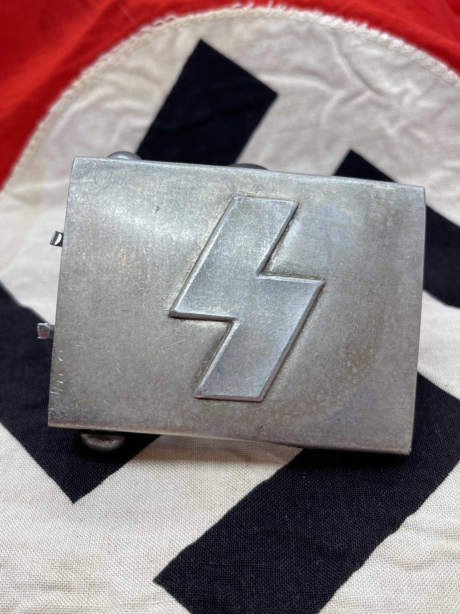 WW2 GERMAN HITLER YOUTH BELT BUCKLE W/RZM MARKS: WW2 GERMAN HITLER YOUTH BELT BUCKLE W/RZM MARKS. THE YOUNGER DJ BOYS WORE THIS BELT BUCKLE WITH A SIMPLE RUNIC LIGHTING BOLT SYMBOL. PLEASE VIEW ALL DETAILED PICTURES. A GREAT FIND AND AND EXCELLENT A