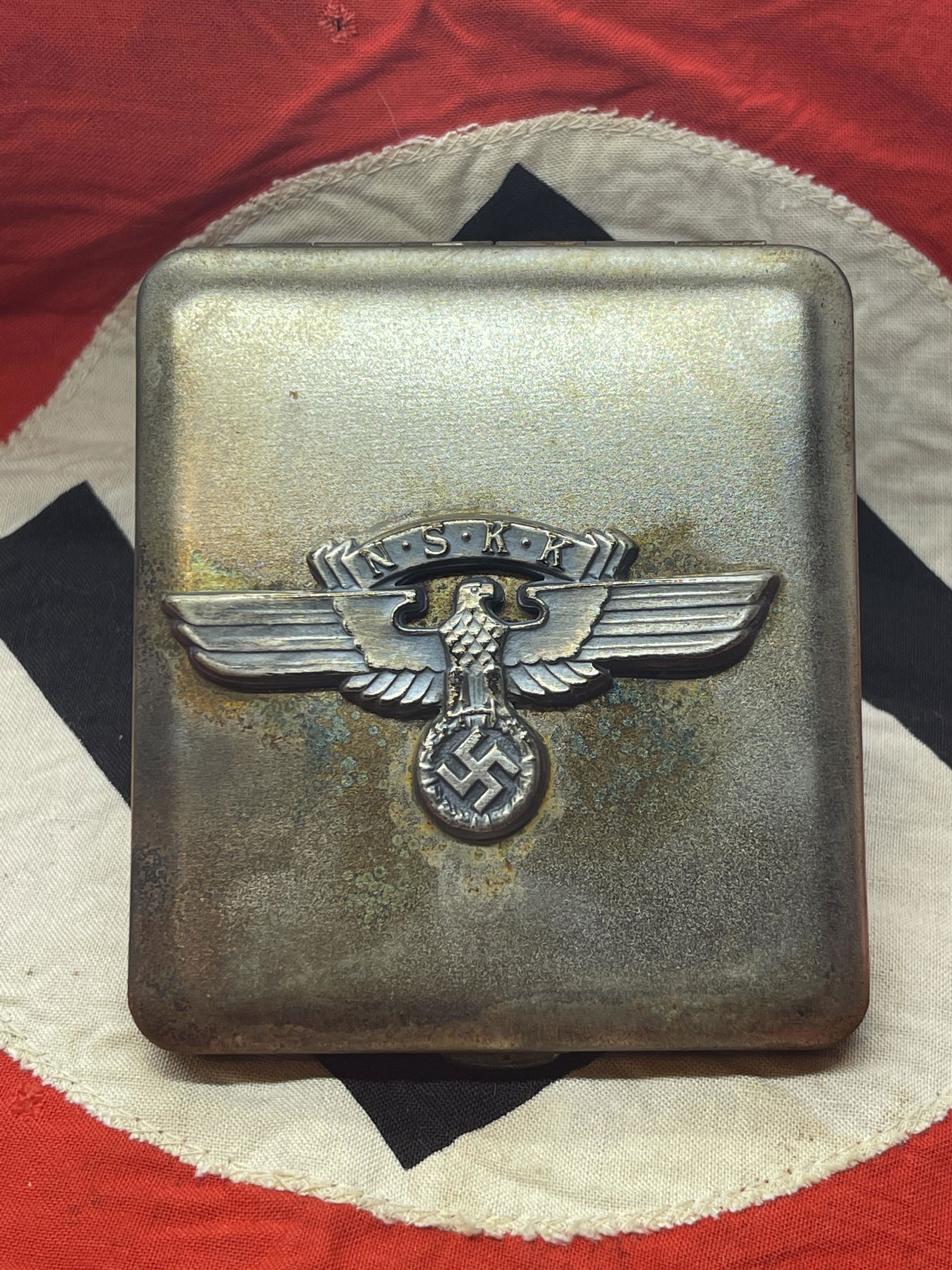 RARE WW2 GERMAN NSKK OFFICER CIGARETTE CASE MAKER: RARE WW2 GERMAN NSKK OFFICER CIGARETTE CASE MAKER MARKED. IN MINT OVERALL SHAPE AND CONDITION. HAS A GREAT LOOK TO IT WITH AN EXCELLENT OVERALL EYE APPEAL. PLEASE VIEW ALL DETAILED PICTURES. A GREAT F
