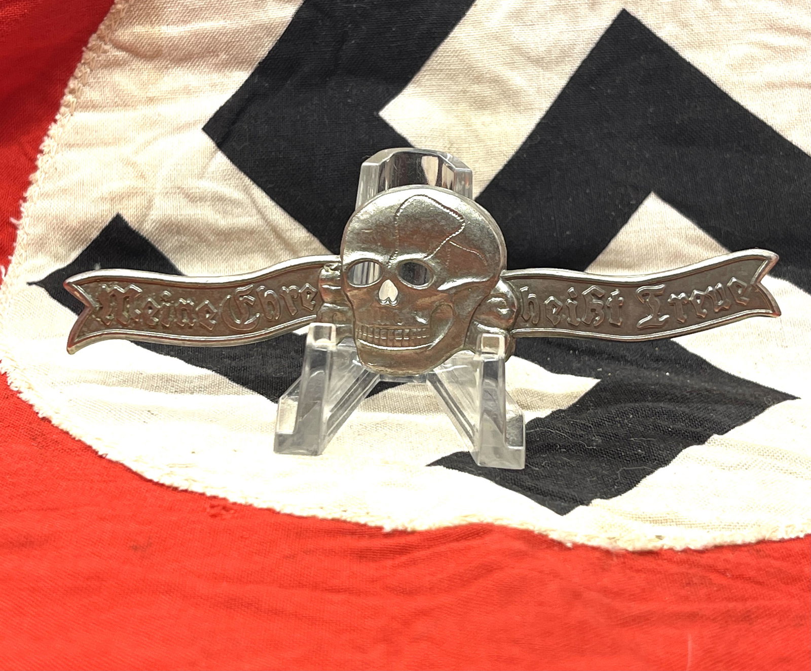 WW2 GERMAN SS SKULL BADGE - MINE HONOR IS TRUE: WW2 GERMAN SS SKULL BADGE - MINE HONOR IS TRUE. IN INT OVERALL SHAPE AND CONDITION. HAS A GREAT LOOK TO IT WITH AN EXCELLENT OVERALL EYE APPEAL. PLEASE VIEW ALL DETAILED PICTURES. A GRET FIND AND AN E