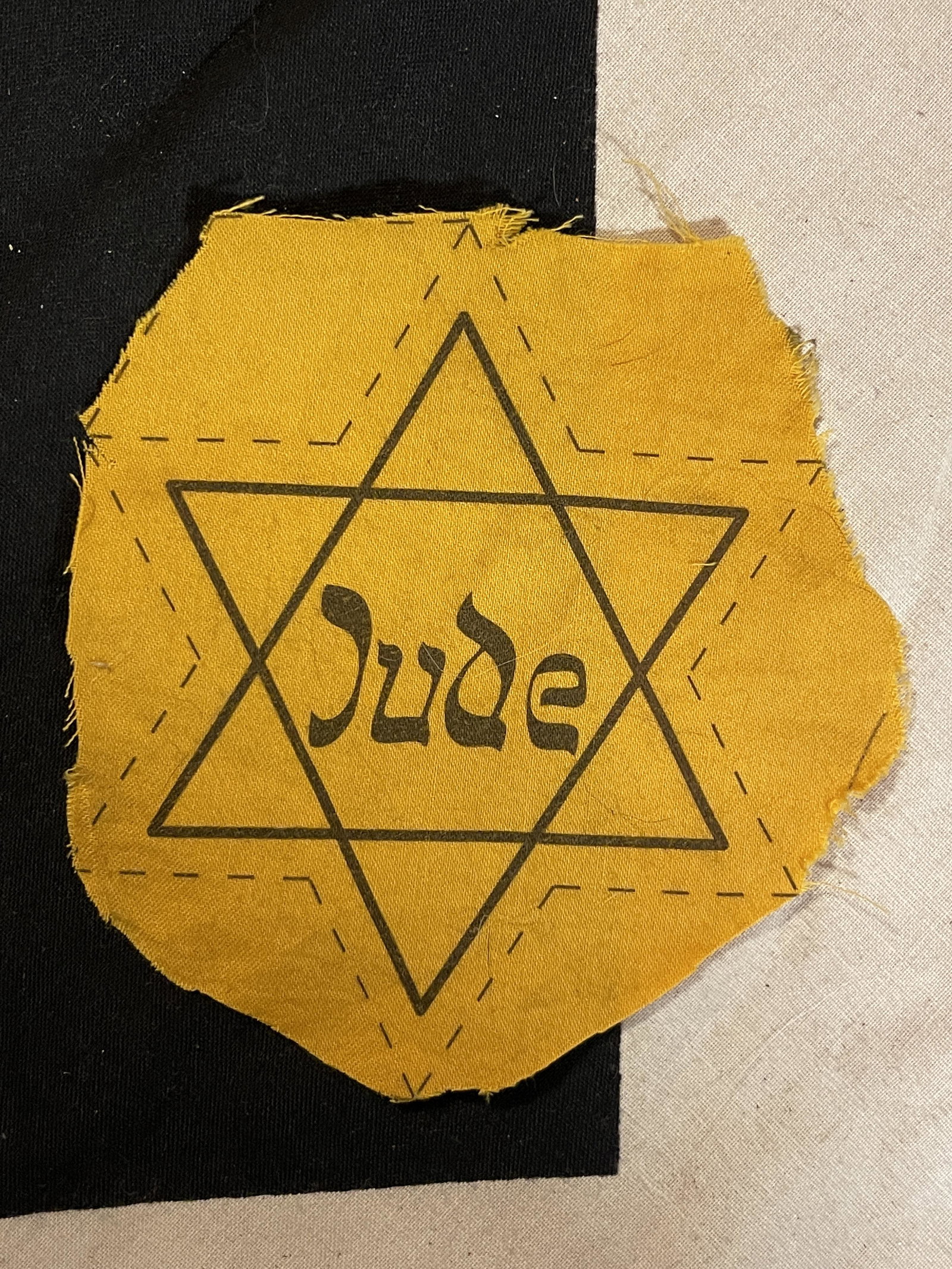 WW2 JEWISH CONCENTRATION CAMP JUDE INSIGNIA - STAR OF: WW2 JEWISH CONCENTRATION CAMP JUDE INSIGNIA - STAR OF DAVID. A VERY RARE FIND. IT IS IN MINT OVERALL SHAPE AND CONDITION WITH A BEAUTIFUL OVERALL PATINA. HAS A GREAT LOOK TO IT WITH AN EXCELLENT OVERA