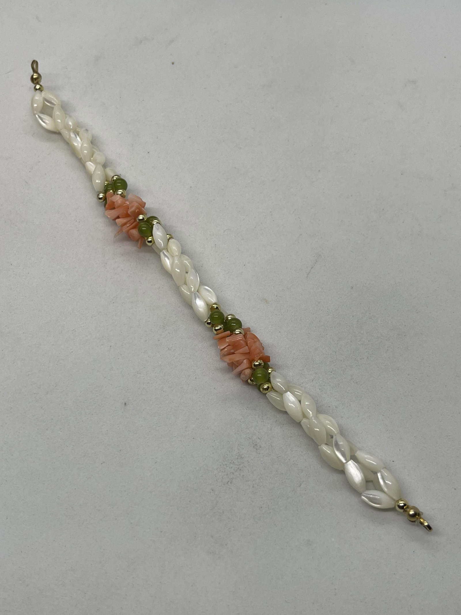 ANTIQUE BEADED PERALS, CORAL & JADE COCKTAIL BRACELET: ANTIQUE BEADED PERALS, CORAL & JADE COCKTAIL BRACELET. IN MINT OVERALL SHAPE AND CONDITION. A GREAT FIND AND AN EXCELLENT ADDITION TO YOUR COLLECTION.
